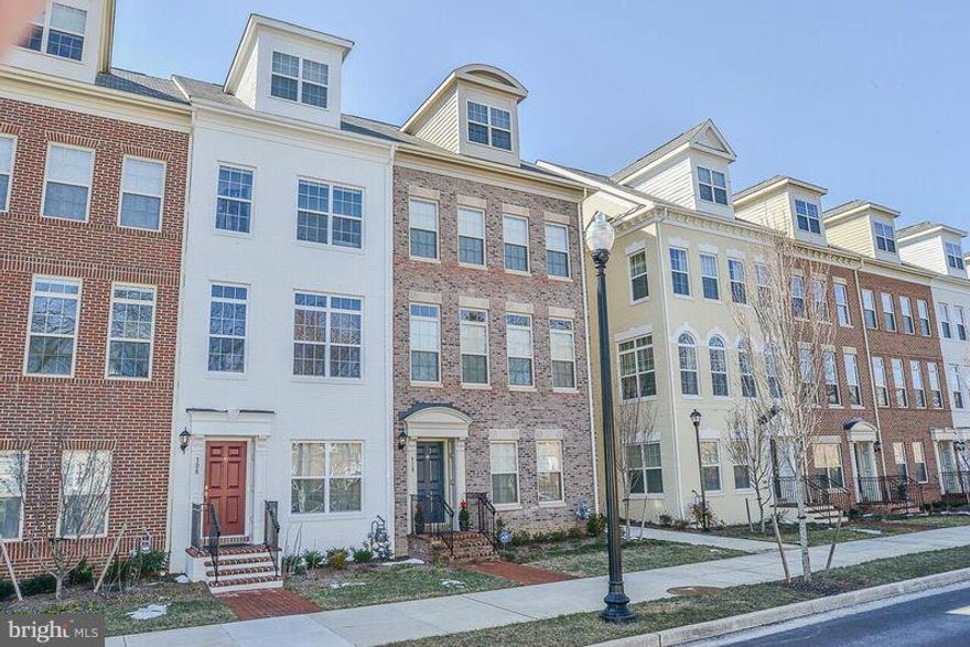 Location, Location! Construction on this like-NEW, END UNIT townhome in Ballston Row was completed July 2015. Special Features: Beautiful Hardwood Flooring, Upgraded Bathroom Finishes, Granite Countertops, 2-Car Garage, and more. Entertain like a pro in this Open Floor Plan! Upper Level Loft and Rooftop Terrace w/ Natural Gas Grill complete this flawlessly appointed home.