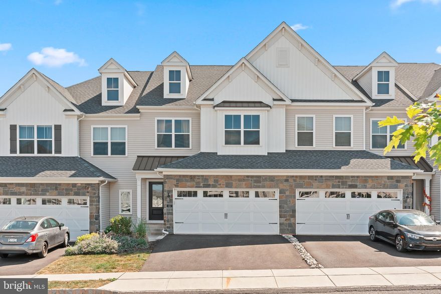 Welcome to this stunning, nearly new Beckett floorplan townhome, featuring 3 spacious bedrooms, 2 full baths, 2 half baths, a finished basement, and a 2-car garage! Designed with an open-concept layout, this home offers endless possibilities for customization to suit your lifestyle. The covered porch and inviting foyer create a warm welcome the moment you step inside.

The expansive kitchen, thoughtfully designed with generous space and every detail in mind, boasts a large center island perfect for seating, seamlessly flowing into the family and dining rooms. Step outside to enjoy the beautiful composite deck, perfectly positioned for easy access and outdoor relaxation.

The second-floor owner's suite is a true retreat, featuring a grand room adorned with elegant crown molding, a large walk-in closet, and a luxurious en-suite bath with a double vanity, separate shower, soaking tub, and linen closet. Two additional bedrooms, each offering ample natural light and large closets, share the second floor, along with a conveniently located laundry room.

The finished basement is ideal for entertaining, complete with a half bath for added convenience. This meticulously maintained home, full of upgrades, is truly move-in ready!