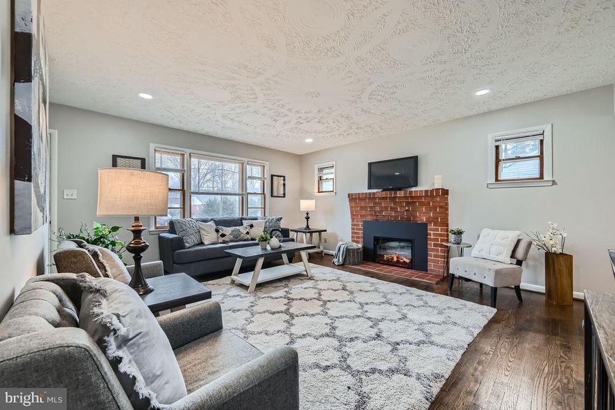 Welcome to this beautifully maintained home offering a perfect blend of luxury and comfort. Featuring stunning hardwood floors throughout the main level, granite counters, stainless appliances and details around every corner, this property provides ample space for entertaining, connection time and quiet relaxation. The home boasts multiple generously sized gathering areas, ideal for hosting guests or enjoying serene moments to rejuvenate.

The electric fireplace adds a touch of warmth and ambiance, making this home feel cozy year-round. Outside, you'll find a freshly paved oversized driveway, providing plenty of parking and easy access. The Trex deck, running the full length of the house, offers a perfect spot for outdoor gatherings or peaceful moments while overlooking the expansive, fully fenced-in yard.

This home is designed for those who appreciate both functionality and style. Don’t miss the opportunity to make it yours!