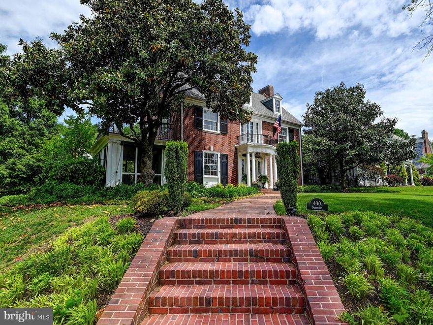 OFFERS DUE BY MONDAY,  MAY 13TH AT NOON.  A tulip's toss from Sherwood Gardens, this lightfilled and refreshed Guilford classic offers spaces inside and out for relaxation and comfortable living.  Six bedrooms and 3 full baths with lush (and flat!)  fenced garden and  gated driveway. Thoughtful and stylish upgrades by the current owners touch almost every room.  Built ins, closet addition, kitchen and primary bath enlargements, terrific bricked floor in family/dining room - and so much more.  Heavy lifting has been done - water heater and 2 of 3 a/c units are new in last several years, reflashing, repointing and more.  So welll maintained.  Don't pause, or this will be a memory.