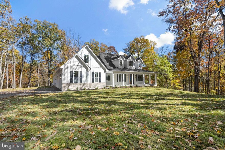 This newly constructed home is ready now! Newly Constructed Cape Cod Home on 8+ Wooded Acres

Nestled in the heart of nature, this newly constructed Cape Cod home combines timeless architectural charm with modern convenience. Positioned on over 8 acres of lush, wooded terrain, this property offers an unparalleled retreat for those seeking tranquility and privacy without sacrificing comfort.

As you approach the home, a picturesque driveway winds through towering trees, creating a welcoming sense of arrival. The Cape Cod's classic gabled roof, symmetrical façade, and dormer windows exude traditional elegance, while contemporary finishes lend a fresh and inviting aesthetic.

Step inside to discover a thoughtfully designed floor plan, where natural light pours through large windows, highlighting the beauty of the surrounding forest. The main level features an open-concept living space, perfect for both cozy family evenings and entertaining guests. A gourmet kitchen serves as the heart of the home, complete with sleek quartz countertops, custom cabinetry, stainless steel appliances, butlers pantry and a spacious island. Adjacent to the kitchen, a formal dining area and an inviting family room with a fireplace offer warmth and charm.

The primary suite, located on the first floor, is a sanctuary of comfort, boasting a spa-inspired en-suite bathroom with a soaking tub, walk-in shower, and dual vanity. A generous walk-in closet completes the space, ensuring convenience and luxury.

Upstairs, an additional bedroom/bonus room provides ample space for family or guests, with full bath convenience. This versatile room offers flexibility, whether you envision a home office, playroom, or media space.

Outside, the expansive property provides endless opportunities to connect with nature. Explore through the wooded acreage, create outdoor living areas, or simply enjoy the serenity of your private retreat. Despite its secluded feel, this home is conveniently located within a short drive of local amenities, schools, and shopping.

This Cape Cod masterpiece blends the best of traditional craftsmanship, modern amenities, and natural beauty. Whether you’re searching for a forever home or a weekend getaway, this property offers a rare chance to enjoy the best of both worlds—elegant living surrounded by the tranquility of 8+ wooded acres.

Garage has plenty of room and storage. 816 square feet insulated, painted trimmed and finished floor. This house will please the most discerning taste.

Don’t miss the opportunity to make this extraordinary home yours!