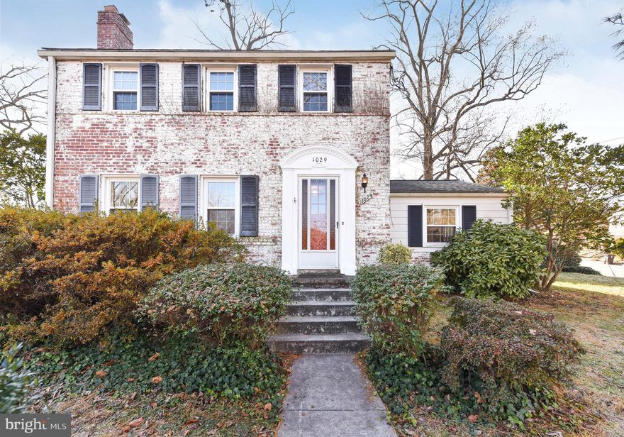 Open Sat 12/15 & Sun 12/16 from 2-4.  Great value for this expanded Colonial in sought after Dominion Hills Historic District near several parks, trails, Metro, and the shops and restaurants at Westover.  Open kitchen/breakfast area with table space plus breakfast bar, tile floors and backsplash and plenty of cabinets and counter space.  Hardwood floors and fireplace in the living room. Side addition offers flexible space for formal dining room or first floor family room. Finished lower level rec room plus  full bath and laundry/workshop.  Brick patio and storage shed in rear.  Ashlawn/Swanson/Yorktown School Pyramid.