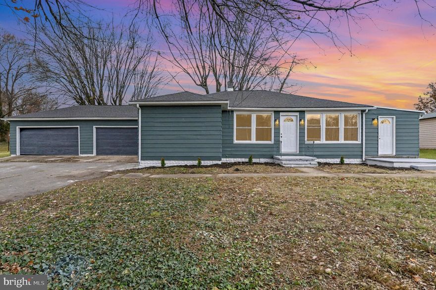 Discover this charming single-level rancher featuring 3 spacious bedrooms and 2 modern bathrooms. The home boasts an attached 4-car garage, perfect for vehicle enthusiasts and storage needs, along with a detached 2-car garage for additional space. Features include quartz countertops, new laminate flooring and carpet throughout, new fixtures and a new roof! Situated on a generous half-acre lot, this property offers ample outdoor potential and privacy. Ideal for families or anyone seeking a comfortable, versatile home in a convenient location.