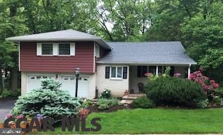 Searching for the diamond in the rough? Check out this hidden gem in Park Forest! Enter the front door to the beautifully tiled foyer, and take in the sensational hardwood floors. The vaulted ceiling in the spacious living room allows lots of natural light to flood in creating a welcoming environment. The sliding door in the dining room not only gives you a view of the back yard, but makes grilling and eating inside a breeze! The elegant spotless kitchen has plenty of cabinets, counter space, and is complete with a cozy nook for enjoying a snack. A few steps away is the large family room where you can lounge around the fireplace. Sit, relax, and enjoy the sunshine in the exquisitely tiled enchanting sunroom. The lower level rec room is great space for entertainment. Enjoy the ample sized master bedroom, with walk in closet, and full bathroom for your privacy. If that wasn't enough there are tons of new items such as: Roof & Driveway (see the full list in extra documents).