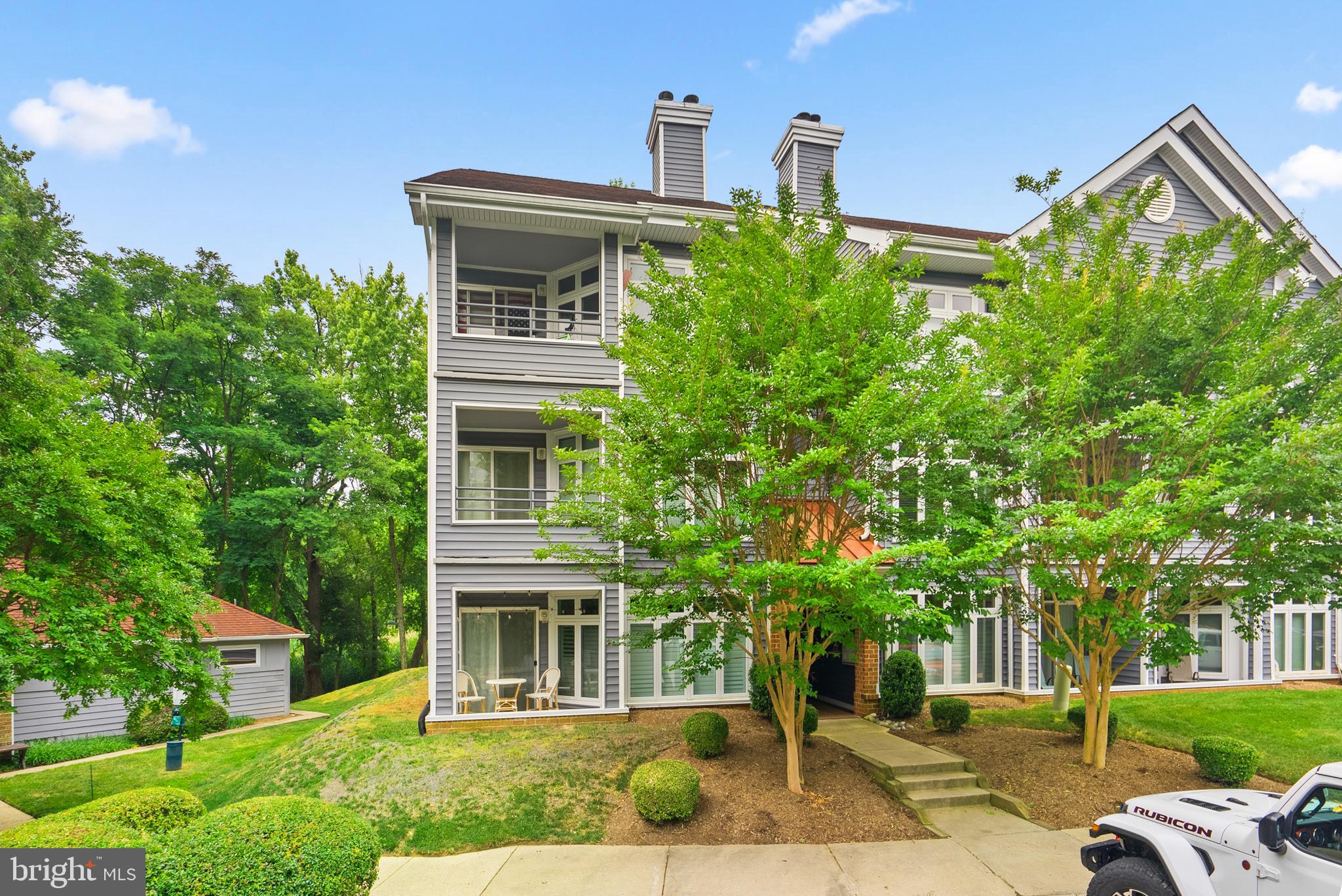Welcome to this beautifully updated and meticulously maintained main level home with 2 bedrooms and 2 bathrooms, offering breathtaking water views of Chase Pond. Situated just 5 miles from downtown Annapolis, this community boasts a swimming pool and an array of wonderful amenities. The interior showcases a tasteful color palette, stunning wood floors, recessed lighting, and an inviting stone-stacked fireplace. The gourmet kitchen is a chef's dream, featuring stainless steel appliances, granite counters, and a modern aesthetic. The bathrooms have been thoughtfully renovated, and the home also offers a convenient full-size front-loading washer and dryer with a custom barn door. The primary suite is a tranquil retreat, complete with a charming accent wall and a walk-out patio that offers serene water views. Don't miss out on the opportunity to experience the coveted Annapolis Lifestyle. Act quickly, as this gem won't last long!
