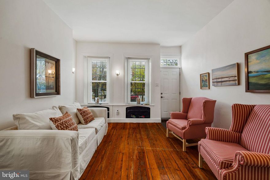 Introducing 2822 Cambridge Street! Situated on one of the finest blocks in Fairmount with wide sidewalks and mature trees, this elegantly updated brick home impresses immediately with elevated ceilings and original hardwood floors. Pass through the traditional living and dining rooms to a fully-renovated kitchen addition with white shaker cabinets and stainless appliances. Behind the kitchen, a brick-walled sunroom at a southern exposure brings natural light through the kitchen and into the heart of the home. Large rear deck and lower brick patio illustrate the luxury of this oversized, 85 foot deep lot. Upstairs are two amply apportioned bedrooms bifurcated by a full bath with shower tub. Original hardwood floors upstairs. Southern exposure to the rear bedroom windows. Green hued light from street trees at the front of the home. Surprisingly spacious finished basement. It’s a flexible space. Perfect for media room, fitness, home office, or even just extra storage. Rear unfinished area at back with mechanicals and laundry, separate and secure from the vibration and noise of any laundry machine. Convenient to the Philadelphia Museum of Art, Lemon Hill at Fairmount Park, and The Boozy Mutt (Pennsylvania’s first indoor-outdoor off-leash dog bar). Human Robot recently announced a new tap room nearby as well. Visit an open house this weekend or schedule your private showing today!