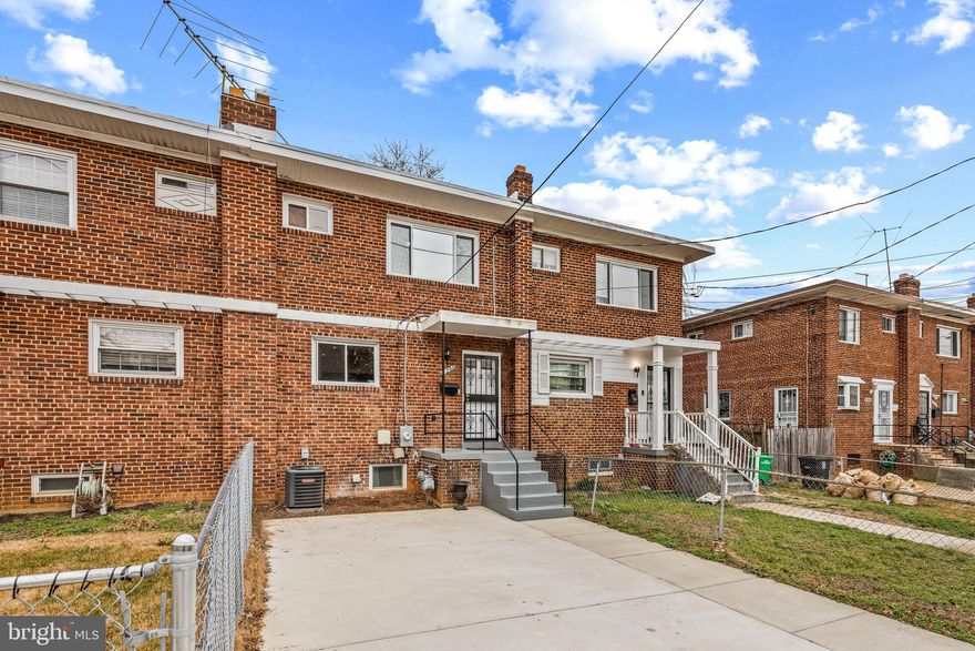 Nestled on a tranquil street, this meticulously renovated residence presents an exceptional opportunity for those seeking the epitome of modern living. Boasting a welcoming newer two-car driveway, this 3 bedroom home with 2 full updated baths and a lower level guest room unfolds seamlessly across its thoughtfully designed spaces. Upon entry, the open floor plan on the main level beckons with gleaming hardwood floors that extend throughout both the main and upper levels. The heart of the home is a chef's delight, featuring a gourmet kitchen adorned with abundant cabinet space, stainless steel appliances, and exquisite granite countertops. Sunlight cascades through updated windows, creating a warm and inviting atmosphere throughout. The allure of this residence extends beyond its interiors, with a rear deck overlooking a large backyard; a perfect canvas for creating your own private garden oasis. Descend to the lower level to discover a versatile space, which includes a recreation room, guest bedroom or office and full bath with tub/shower, complemented by full ceramic surround. The lower level also houses a newer washer and dryer for added convenience. Strategically located just minutes away from major highways, Washington DC, and the National Harbor, this home seamlessly blends suburban serenity with urban accessibility. Immerse yourself in the perfect harmony of elegance and functionality, as this property invites you to embark on a new chapter of refined living.  NOTE: This property is being Sold AS-IS.