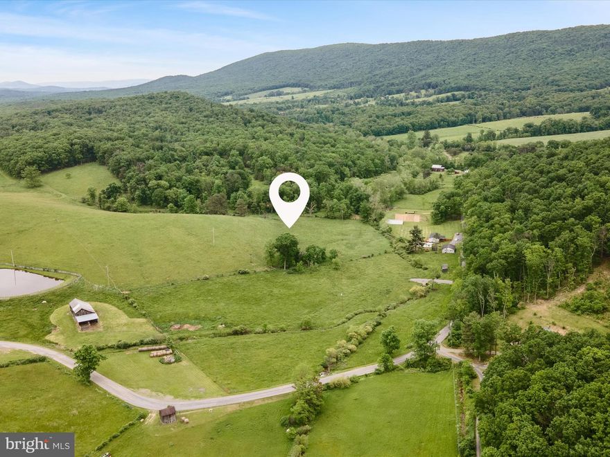 Discover 6.7 unrestricted acres of rolling pastureland nestled in a serene and scenic setting. This beautiful property offers stunning views, a peaceful atmosphere, and a gentle stream flowing through the land—creating the perfect backdrop for your forever home. With no restrictions, it’s ideal for horses, farm animals, or building the homestead of your dreams. Located just minutes from a local wildlife center, you’ll enjoy the perfect blend of natural beauty and rural freedom. Don’t miss this rare opportunity to own a slice of countryside paradise!