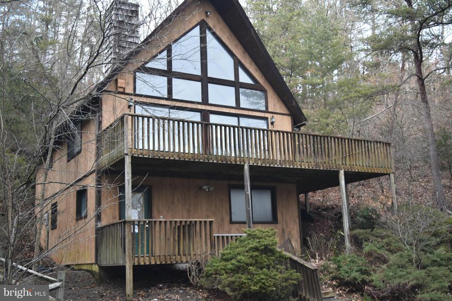 Excellent Buy !! Instant Equity !!  Priced thousands below 2014 tax assessment.  Beautiful views of the mountains and ski slopes. . Home features 3 levels, 3 bedrooms, 2.5 baths, great room with floor to ceiling windows, free standing woodstove, equipped kitchen, Property suitable for year round living. A little TLC Will make her the best buy in the Resort. This is a Fannie Mae HomePath Property.