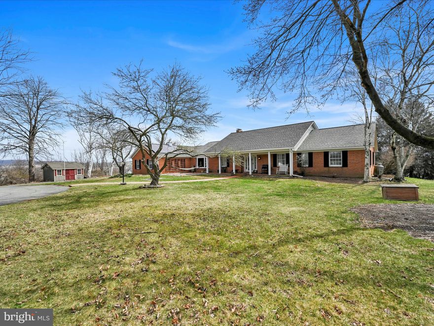 UPDATE: Multiple offers received - final and best offer deadline set for Tuesday 4/8/25 at 4pm.
Nestled on a peaceful cul-de-sac within the highly regarded Blue Mountain School District in Orwigsburg, this exceptional 4-bedroom, 3 full bath, 1 half bath residence offers over 3,800 square feet of living space on a sprawling 2.1-acre lot. Prepare to be captivated by the panoramic views that surround this remarkable property. The expansive layout features a bright and inviting living room, complete with a propane fireplace and custom built-ins, perfect for cozy gatherings. Hardwood and laminate floors flow throughout the home, adding warmth and sophistication. Enjoy formal meals in the elegant dining room, enhanced by a charming bow window. The well-appointed kitchen boasts a separate prep area, a walk-in pantry for ample storage, and a delightful breakfast nook where you can savor your morning coffee while soaking in the beautiful surroundings. The first floor features not one, but two bedrooms with private full baths, including the owner's suite with a dressing room area and bath with a walk-in shower. A dedicated first-floor study/office provides the perfect space for remote work or quiet reflection. The family room, complete with a fireplace, offers a comfortable space for relaxation, while the all-season/game room, with its distinctive wood and brick-paneled walls, is ready for entertainment and recreation. The home also includes a convenient guest powder room off the two-story open foyer and first-floor laundry space.  A partially finished 900+ square foot basement offers additional recreational space and ample storage. Step outside to the expansive rear wrap-around deck, designed for ultimate privacy and relaxation. The oversized 2-car garage provides ample parking and storage, with convenient interior access via the mud room. The 2.1-acre lot offers plenty of space to enjoy the tranquility and breathtaking panoramic views. This home offers a rare combination of space, comfort, and stunning natural beauty. Don't miss the opportunity to make it yours!