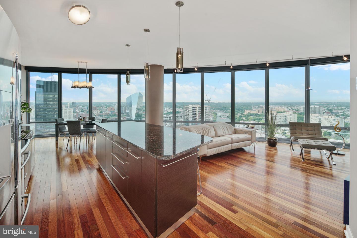 Welcome to Unit 3502 at the Murano — a luxurious, light-filled one-bedroom residence perched high above the city on the 35th floor of one of Philadelphia’s premier condominium buildings. With breathtaking unobstructed north-facing views, this stunning home combines modern design, top-tier amenities, and an unmatched location in the heart of Center City. Step into a spacious open-concept living area featuring floor-to-ceiling windows that bathe the space in natural light. The sleek kitchen is outfitted with granite countertops, stainless steel appliances, and a breakfast bar — perfect for entertaining. The oversized bedroom easily fits a king-size bed and offers generous closet space. A modern full bath, in-unit washer/dryer, and hardwood floors throughout complete this move-in-ready home. Enjoy your private balcony, ideal for relaxing and taking in panoramic skyline views — an incredible place to start or end your day. The Murano is a full-service building offering residents 24-hour concierge, a state-of-the-art fitness center, a heated indoor lap pool, a sun terrace, a community room, and valet parking. Just steps from Rittenhouse Square, 30th Street Station, the Schuylkill River Trail, Trader Joe’s, and countless restaurants, you’re connected to everything the city has to offer. Monthly condo fees include water, building amenities, and one assigned parking space in the attached covered garage, one storage locker. *Photos are of a similar unit with the same layout. Subject unit is located on a higher floor with superior views.
NEIGHBORING UNIT IS ALSO AVAILABLE FOR A POTENTIAL COMBINATION UNIT/THREE BEDROOM