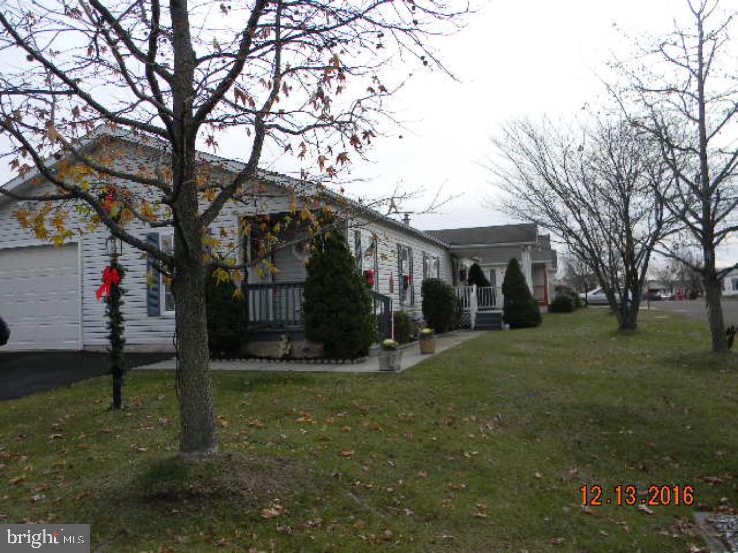 Welcome to Willow Run 55 and up Community. This corner lot home has been well maintained and is move in ready. The current owner added on some extra square footage to original floor plan to increase the original room sizes. This home offers a one car garage with garage door opener and access from garage into the home. Two cars can easily fit in the driveway as well. A covered corner entrance gives you access to enter into the home. Once inside there is a foyer area with coat closet. The living room is a very good size and flows into the formal dining room. Plenty of cabinets and counter space along with an island would delight every cook or baker. Both bedrooms are a good size along with great closet space. The main bedroom does offer a full bath with dual sinks, a stall shower and two octagon windows for extra light. The hall bathroom offers a tub/shower combo. From the laundry room is a door that leads to the outside covered porch. A great place sit and enjoy being outside. There is also a shed on property for extra storage. Owner is offering a one year home warranty.