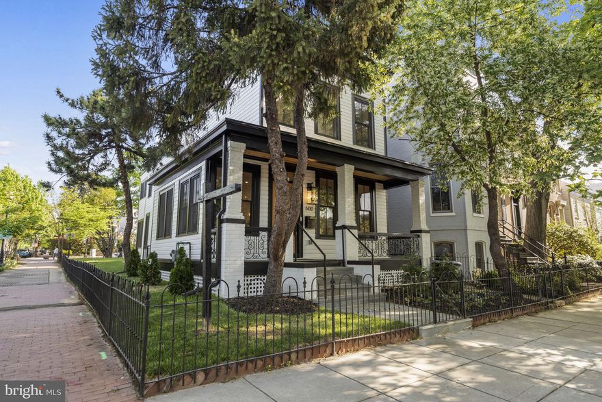 This corner historic federal home has all that you've been waiting for and in the true heart of Capitol Hill! Built in 1900 and recently renovated this year, it's the perfect blend of old charm intertwined with modern and contemporary flare. Open floor plan on main level with stone fireplace and custom built-in's. You will absolutely be enamored with the chef style kitchen, which offers generous counter space, viking appliances, designer finishes/ fixtures, custom cabinetry and more. Bedroom level features a spacious master with his and her closet space and en-suite bath, along with two additional spacious bedrooms both equipped with en-suite baths for privacy. Mezzanine level is perfect for au pair or your in-laws. Providing full kitchen with one bedroom and full bath. The rear yard has off st parking that is extremely convenient and the garage is a perfect spot to have an art studio, office or yoga space .The choice is yours!! Located 2 blocks from Eastern Market, 3 from the EM metro, 2 from groceries, menus,; 3 from laundries, 2-4 from exciting Parks. The community is friendly, amenable, opinions shared freely and diversity encouraged. The range of cuisine range from historical pubs, jazz venues w/ a menu to Indian , Iberian, German, Italian, French, Belgian, Thai, Ethiopian, Laotian, Salvadoran, Japanese, Chinese, & N American… and FUSION. So much to fall in love with and certain to fulfill all your desires. Come and see for yourself!