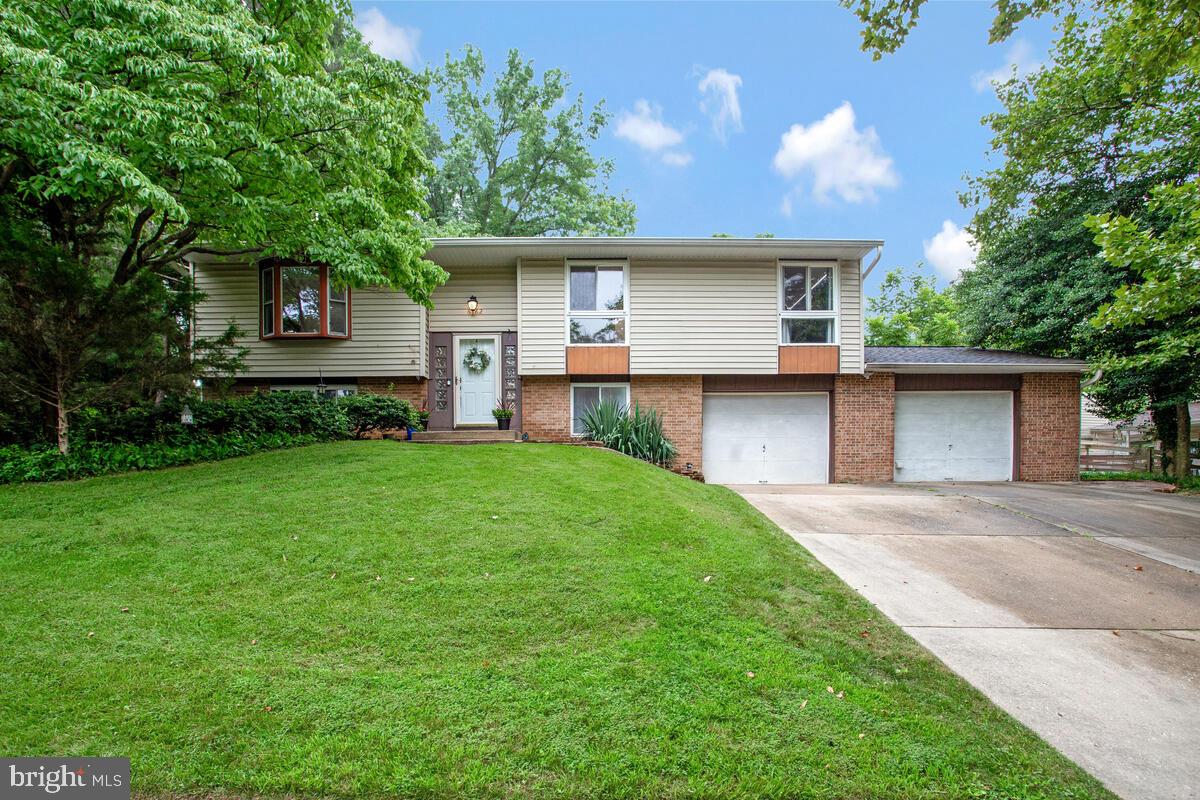 Lease start date of Aug 1st* Welcome to this updated 4-bedroom, 3-bathroom home in the heart of Columbia, Maryland. Situated on a quarter-acre lot, perfect for gardening, playing games, or relaxing evenings outdoors. There’s already a grapevine growing around the deck, adding charm and the potential for fresh harvests.
Inside, you’ll find a kitchen with updated appliances and fully renovated bathrooms. The lower level features a bonus room perfect for a home office or guest space, plus a second living area ideal for gaming, movie nights, or a cozy den. Upstairs, a bright room with large windows offers a great space for a library, reading room, or additional office. The second garage bay has an air conditioned space that is currently used as an art studio. This home offers easy access to Columbia’s best amenities. You’re minutes from Lake Elkhorn, Blandair Regional Park, and the extensive Columbia trail system. Enjoy concerts at Merriweather Post Pavilion or explore the shops and dining at The Mall in Columbia. Nearby grocery options include Whole Foods, Wegmans, and Giant, and you're close to local farmers markets and community events throughout the year. With its central location, updated interior, and flexible layout, this home is ready for you to move in and make it your own.