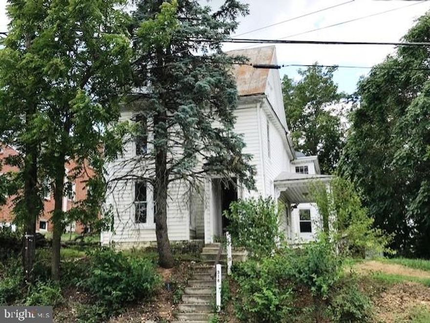 Three unit separately metered property in the heart of downtown Westminster.  Quick walk to all the cool "Main St" shops, restaurants and awesome events downtown.  Great investment property or live in one unit and rent the other two.  Two one-bedroom units and one two-bedroom unit plus a storage shed in the rear. Spacious covered side porch on Unit A.  Property needs improvements and updates but has good bones. Buyer's responsibility to do their due diligence to verify all data on this property.    Great commuter location to Baltimore and I-795. Just a mile or two from the county hospital, medical facilities, farm museum, Agg center, grocery stores, restaurants and much more.