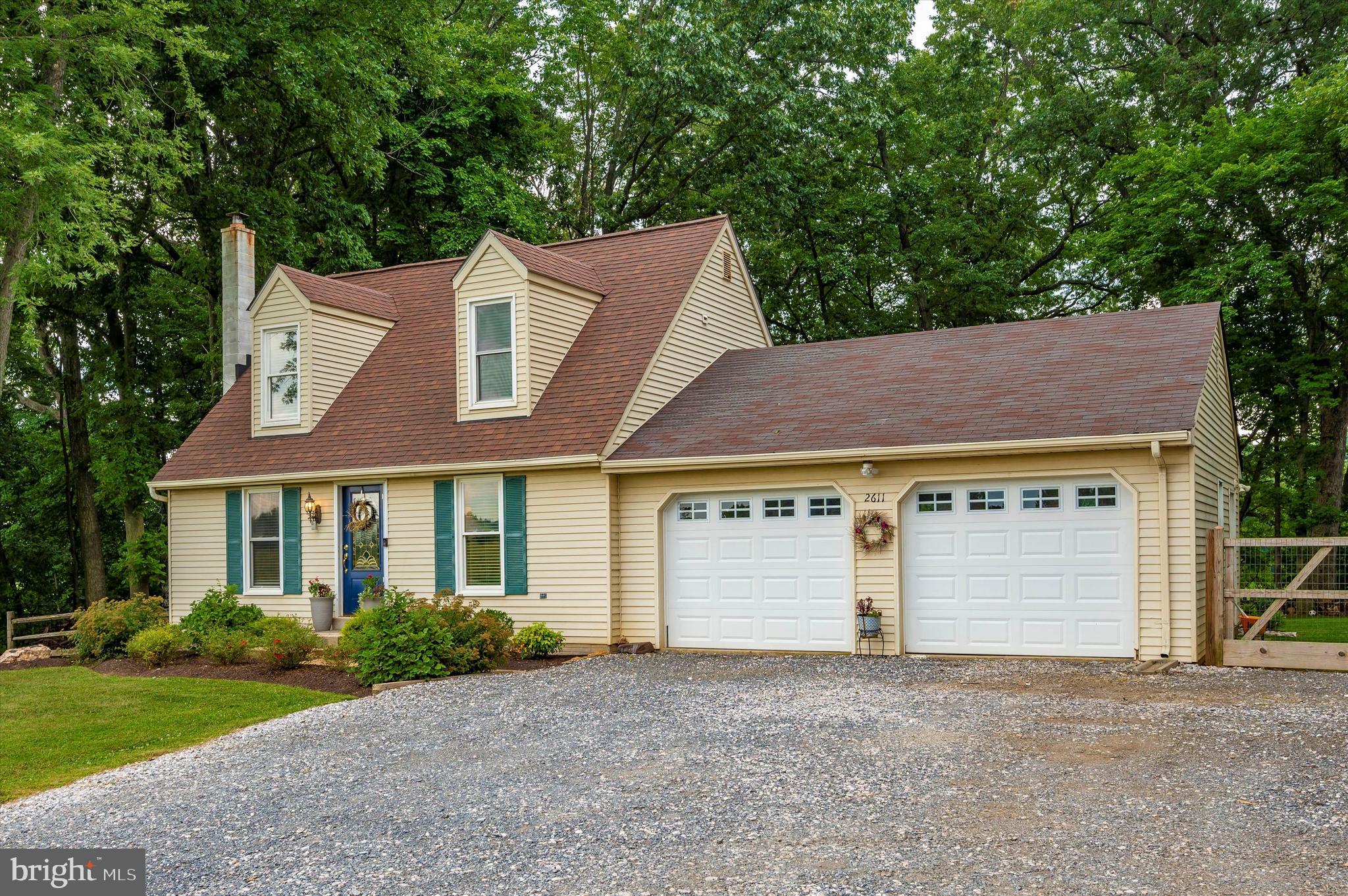 Professional pictures will be uploaded Sunday July 17th. Open House Sunday 1-3pm
This cape cod is so charming! Tucked away on a long private drive, this place gives you the real Carroll County rural feel! Ample parking in front of the home and plenty of additional parking to the side - perfect location for a future shop. The attached 2 car garage has plenty of shelving storage. Inside you'll notice newly installed LVP throughout the home, granite countertops, upgraded white cabinets, and a practical layout. There is a main level bedroom with attached en-suite, an ideal set up for a private primary bedroom. Upstairs bedrooms share a hallway bath with updated floor & vanity. The finished basement has a wood stove that heats the whole home, and walk up stairs to the back yard, perfect for wood transfer. Laundry and storage located down there as well! The lot is absolutely stunning and very private. There is close to 1 acre fenced in the back with mature trees overlooking farmland. Front yard overlooks crop farmland with beautiful sunsets.