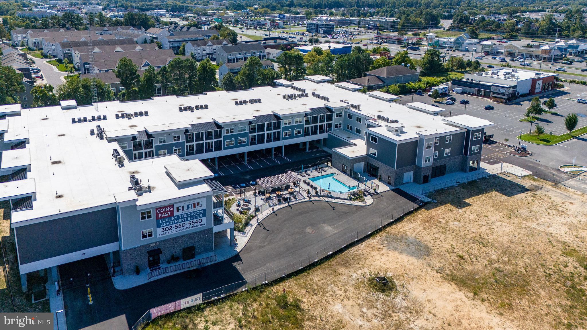 FLATS AT COASTAL STATION - Residential