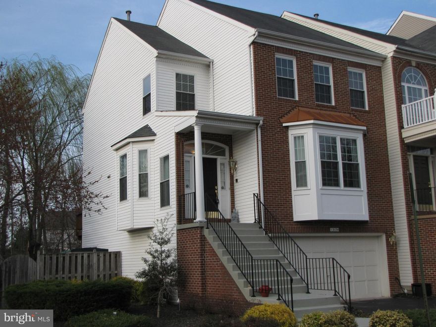 Great location--Fair Lakes! End unit TH w/ brick,2 car garage,backs to woods! New windows throughout! New HVAC! New hot water heater!  Granite & stainless in kitchen! New fridge! Travertine backsplash! Hardwoods! Family rm w/gas fireplace off kitchen! Breakfast rm off kitchen w/o to large deck! Master w/3 closets & vaulted ceiling w/skylights! Beautiful baths! Large rec rm! Fenced yard!