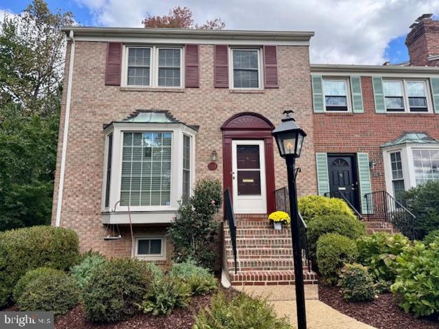 ***Professional Photos Coming***Charming All-Brick End Unit Townhouse in Vienna's Heart

Discover this rarely available, all-brick end unit townhouse, perfectly blending old-world charm with modern convenience. Situated in a quaint Vienna neighborhood known for its gas lamps and close proximity to the world-class amenities of Tysons Corner, this home checks every box. Boasting three bedrooms, two full baths, and two half baths, it offers space and sophistication across three finished levels.

Upon entering the spacious foyer, you are greeted by the large, updated kitchen featuring newer cabinets, double wall ovens, cooktop, sleek granite countertops, and a bright bay window overlooking the manicured front landscape —a true chef's haven. The kitchen flows effortlessly into the large dining room, which opens to an expansive living room. Here, a beautiful fireplace is the focal point along with the floor-to-ceiling windows, providing tranquil views of the private, fenced backyard.

The upper level features elegant hardwood flooring. Retreat to the generous Primary Bedroom with an updated, private ensuite bathroom. Two additional ample-sized sun-filled bedrooms and an accommodating full hall bath complete the upper floor.

The Lower Level Retreat: The newly carpeted, fully finished lower level provides excellent additional living space, perfect for entertaining or relaxing. It includes a spacious recreation room with a second fireplace and a walkout access to the serene screened-in porch. You'll also find a versatile multi-purpose room, ideal for a home office or gym, plus a half bath and dedicated laundry room, making this level a perfect private retreat. 

Outdoor Oasis & Entertaining:

Step outside to your private, fully-fenced corner lot oasis. Enjoy tranquil evenings on the screened-in porch or host sunny gatherings on the exterior deck with open pergola. The oversized bonus storage shed provides ample room for all your recreational equipment, completing this exceptional outdoor package.

Roof - 2014, HVAC - 2020, Water Heater - 2025, Windows have been Replaced (not original).