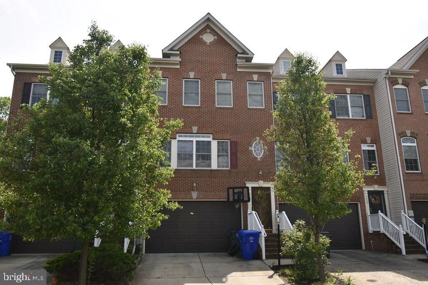 ****BIG PRICE CORRECTION******Super spacious, 4 level brick front townhome with 2 car garage.  The main level includes a huge living room, spacious kitchen, and family room with fireplace!  The upper level boasts 3 bedrooms including a primary suite with vaulted ceiling, walk in closet, and bathroom with soaking tub!  There is a lower level rec room with half bath PLUS and unfinished basement with walkout to the backyard.  The top 3 levels all have a deck to enjoy the outdoors.  This one will sell fast!