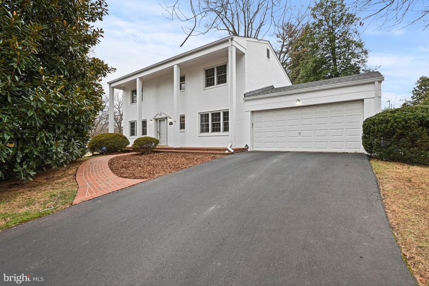 Open Houses:  THURS 1/8/26 @  *3-5pm*

Stately brick 3-level Colonial set on a flat .36-acre lot in an ideal location in desired McLean Hamlet.   A welcoming foyer opens to a large living room featuring a wood-burning fireplace, abundant natural light, and refined moldings. The formal dining room opens to the family room and kitchen, and has sliding glass doors that lead to the backyard.  A spacious eat-in kitchen is equipped with updated lighting, double wall ovens, a five-burner gas cooktop, KitchenAid dishwasher, GE Profile refrigerator, microwave, and generous counter space. IDEA:  Open up walls to redesign the floor plan.  

The main level also includes hardwood floors throughout, crown molding and chair rails, a convenient half bath for guests, and direct access to a deep two-car garage with storage and an additional refrigerator.

The upper level features a serene primary suite with ceiling fan, walk-in closet, and an en-suite bath. Three additional sun-filled bedrooms offer large windows, ceiling fans, and deep closets, complemented by a full hallway bath with a tub and shower combination and an additional walk-in storage closet. 

The fully finished lower level provides an expansive recreation room with a gas fireplace, large windows for abundant natural light, and a mounted television, along with a FULL BATH, and a large utility and laundry room complete with an LG washer and dryer, utility sink, shelving, workshop space, and ample storage. Walk-up access leads directly from the lower level to the fully fenced backyard and patio, ideal for outdoor enjoyment.  IDEA:  Finish off some of the large storage space for a guest room.  

McLean Hamlet is a sought-after, tree-lined community known for its sidewalks, minimal traffic, and welcoming neighborhood feel.  BONUS:  Students enjoy convenient access to a bus stop at Birnam Wood Drive and Elsinore Avenue, optional membership to the McLean Hamlet Swim and Tennis Club with year-round activities for all ages, and proximity to Spring Hill Elementary, parks, and the Spring Hill Recreation Center. Close proximity to Scotts Run Nature Preserve and Great Falls Park.  The location offers easy access to I-495, Route 7, and the Dulles Toll Road, is just two miles from the Silver Line Metro, and only ten minutes from Tysons Corner Center.
