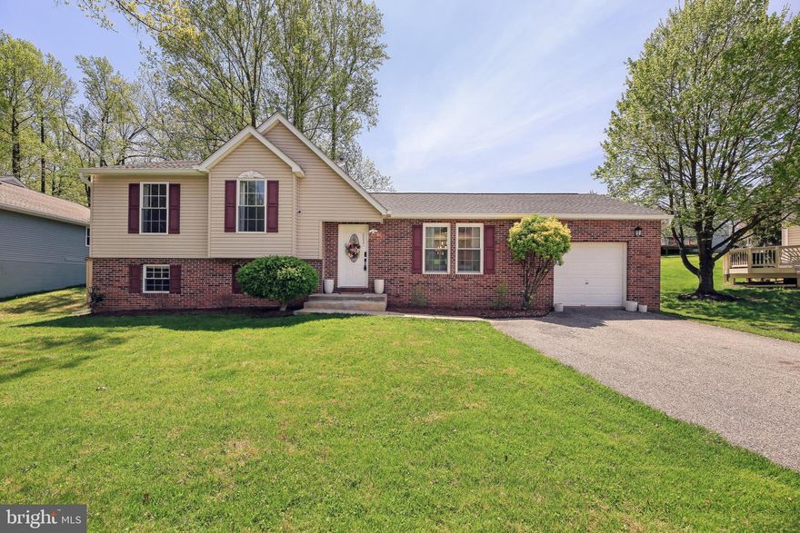 Welcome to 9619 Brie Road, where space, comfort, and flexibility come together in the sought-after Woods of Winands community. This 5-bedroom, 3-bath split-level home sits on a quiet street and offers a smart four-level layout designed to adapt to your lifestyle—whether you're working from home, hosting guests, or simply looking for room to spread out.

The main level features gleaming hardwood floors, spacious living and dining areas filled with natural light, and a well-equipped kitchen with ample counter space and modern appliances. Sliding glass doors lead to a raised patio in the backyard—perfect for outdoor dining, gardening, or enjoying a peaceful moment in your private green space.

Upstairs, three comfortable bedrooms include a generously sized primary suite, while the finished lower levels offer exceptional versatility. A cozy den leads to a walk-out basement featuring a home office, a bonus room ideal for a gym or guest space, and a large storage area to keep everything organized and out of sight.

Additional highlights include an attached one-car garage, a wide driveway, and a backyard shed for extra storage. With a prime location close to shopping, parks, schools, and major commuter routes, this home delivers the perfect balance of everyday convenience and peaceful neighborhood charm.

9619 Brie Road is move-in ready and packed with possibilities—schedule your visit today and discover all that it has to offer.