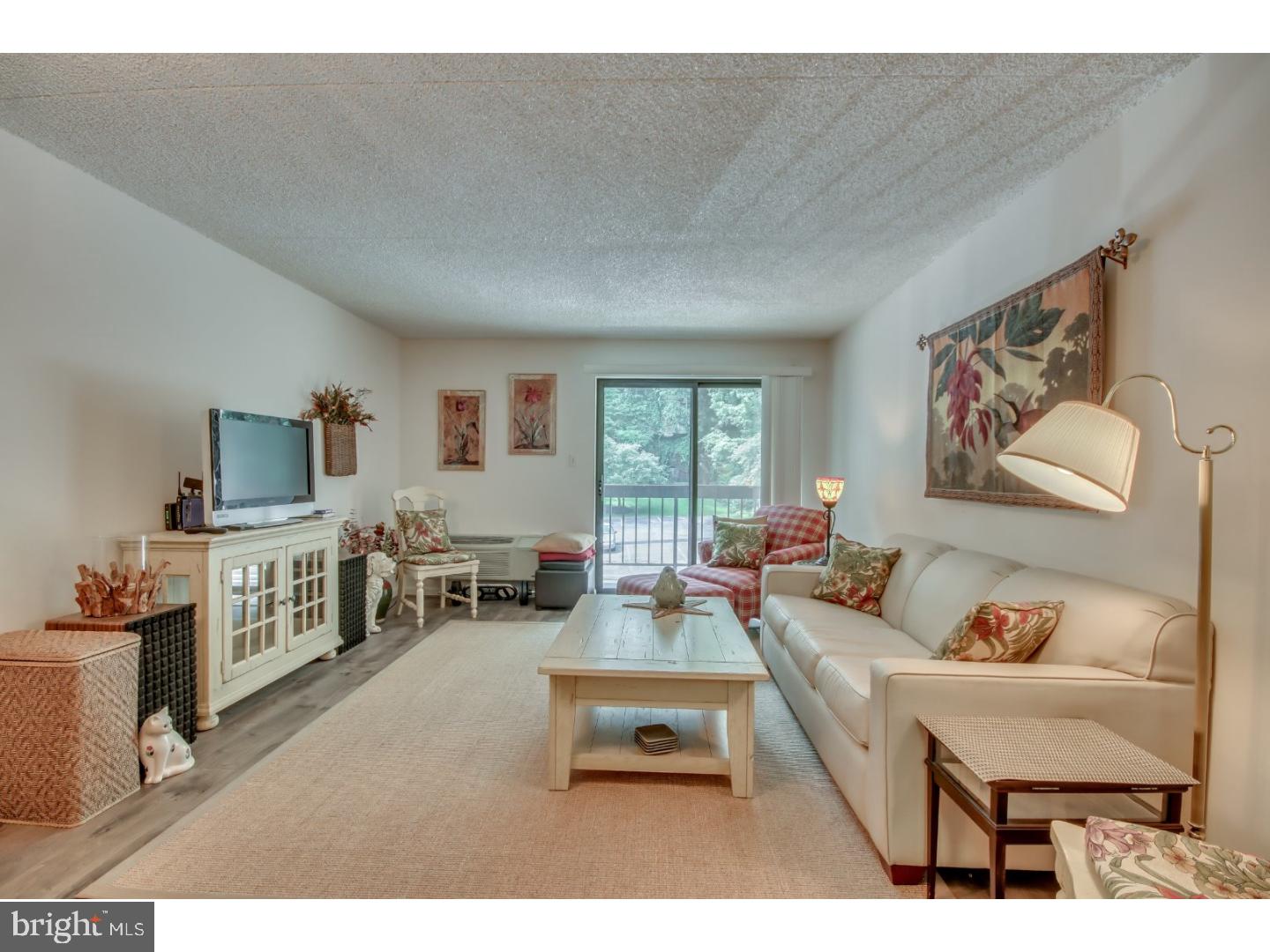 This sunny one-bedroom unit with fresh paint & carpet & decorative wood floor offers a carefree lifestyle in a secure elevator building with swimming pool, tennis court and in-unit laundry facilities. Step into the recently renovated lobby for a taste of the Crum Creek way of life. The 2nd floor sitting area is a perfect spot to read a book and greet neighbors. Unit 2P offers a spacious layout with an open living and dining area and kitchen. The living space is filled with sunlight from the great big sliders to a private balcony with views over the treetops. The master bedroom boasts double closets and another large window with a lush green view. The dining room is off the entry and could easily fill in as guest or nursery space for a creative buyer. The large laundry/storage room keeps the rest of the home neat and tidy. Crum Creek Valley Condominium is located just minutes from 95 and 476 as well as public transportation and shopping, and is served by the prestigious Wallingford-Swarthmore School District. The association takes care of trash and exterior maintenance so you can relax and enjoy your new home!