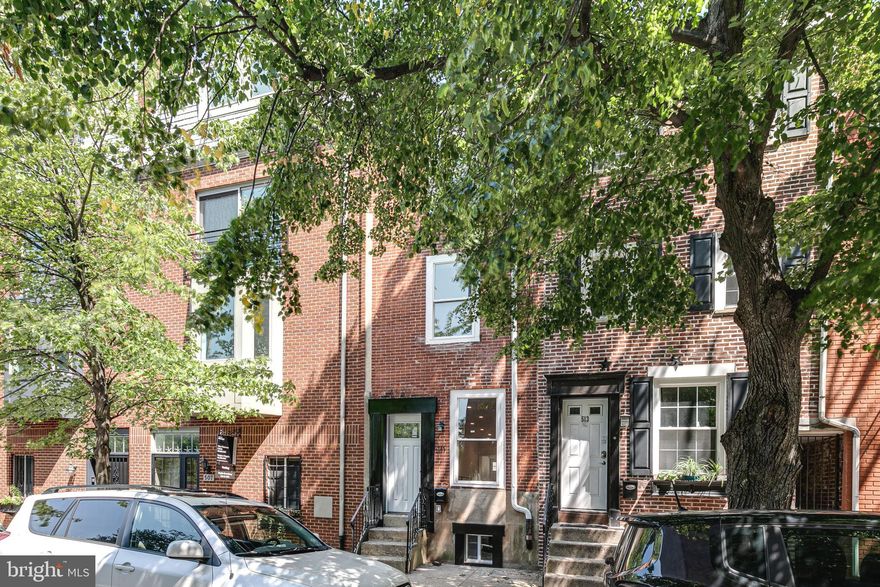 Welcome to this beautifully renovated, 3 bed, 2 bath home full of character in sought after Fitler Square. Upon entering, you’ll be greeted with an exposed brick wall, gorgeous white oak hardwood floors and high ceilings with recessed lighting throughout, making this home feel bright and airy. The floating staircase with black iron railings and exposed ductwork adds an industrial feel to the open living and dining areas. Make your way back to the bright kitchen complete with classic white subway tiles, white shaker cabinets and stainless steel appliances. Off the kitchen is a back patio, perfect for grilling and lounging. The high ceilings continue throughout the second floor where you’ll find two bedrooms and a full bathroom with sleek finishes and a glass shower door. The primary suite encompasses the third floor, with a large bedroom and full bathroom, before you head up to your private roof deck, perfect for entertaining. The fully finished lower level offers additional space for lounging, a gym, playroom - the sky’s the limit. Don’t miss your chance to live just over the bridge from Penn, CHOP and University City, and a quick walk to Center City, Schuylkill River Park, and all that prestigious Fitler Square has to offer.