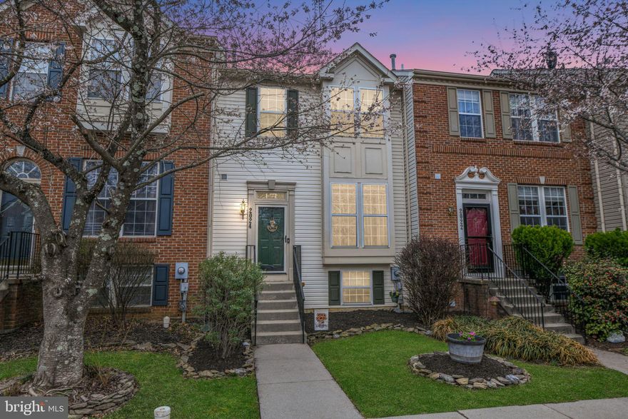 Welcome to this beautifully maintained townhome in the highly sought-after Willow Brook neighborhood! The open-concept main level is filled with natural light and features a stylish kitchen with granite countertops and stainless steel appliances — perfect for everyday living and entertaining. The kitchen seamlessly connects to a spacious dining area and an inviting family room, creating an ideal space for gatherings. Gleaming hardwood floors lead to a large deck and a fully fenced backyard, perfect for relaxing or hosting guests. A convenient powder room completes the main level. Upstairs, you'll find a luxurious primary suite offering a private retreat with a walk-in closet and an ensuite bath featuring a soaking tub, dual vanities, and a separate shower. Two additional bedrooms and a full hall bath complete the upper level. The finished lower level offers a versatile recreation room, perfect for a home theater, playroom, or gym, plus an additional storage room. Enjoy the convenience of two assigned parking spaces and ample visitor parking. The community boasts fantastic amenities, including basketball courts, scenic walking/jogging paths, and playgrounds—all just steps from your front door. With easy access to major commuter routes, this home truly has it all. Don’t miss your chance to own in Willow Brook—schedule your tour today!