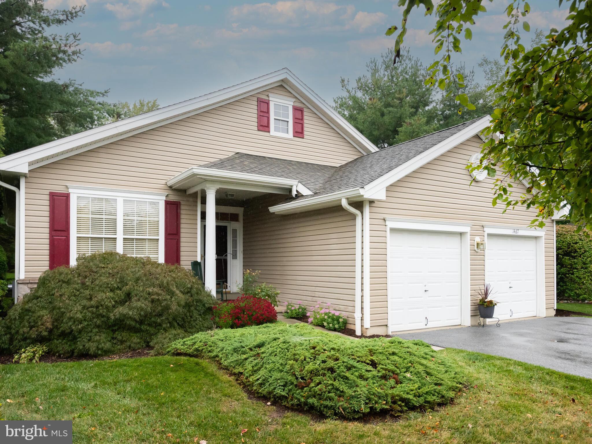 Sought after Single in Quaker Village with finished Lower Level and attached 2 car garage. This is a Cedar Model with formal Living Room and Dining Room with crown moldings right off the Foyer. Move back to the Family Room with updated wide-plank hardwood floors, triple windows and door to the Deck. The Family Room opens to the Kitchen and Breakfast area to enjoy your morning beverage next to a large double window overlooking the Deck and private rear of the house. The Kitchen was renovated in 2021 with upgraded grey cabinets and light granite counters and backsplash, under cabinet lighting, a Pantry closet, gas range, recessed lighting and wide-plank hardwood floors installed at the time of remodel. The Primary Bedroom Suite has a Walk-in Closet, wide-plank hardwood floors, En-suite Bath with updated tile tub surround and updated stall shower with built-in seat, Double Sinks, and jetted Jacuzzi Tub. The Main Level includes a 2nd Bedroom/Office/Den with large closet, updated Full Bath with a Tub-Shower and sink, and a Laundry room with access to the attached 2 car oversized garage. The Lower Level is finished with an open concept Recreation Room, an office/bonus room, and Storage areas. The oversized Deck has a remote-controlled retractable awning and just a few steps down to ground level. This lovely home has upgrades including updated wide-plank hardwood floors, Crown Moldings, HVAC replaced in 2020, and more. Furnishings are negotiable. Enjoy the wonderful lifestyle of an ACTIVE Gated Community with its many activities and mature landscaping.