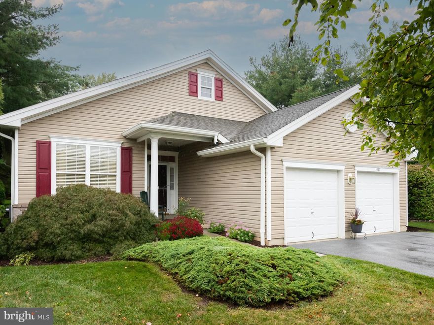 Sought after Single in Quaker Village with finished Lower Level and attached 2 car garage. This is a Cedar Model with formal Living Room and Dining Room with crown moldings right off the Foyer. Move back to the Family Room with updated wide-plank hardwood floors, triple windows and door to the Deck. The Family Room opens to the Kitchen and Breakfast area to enjoy your morning beverage next to a large double window overlooking the Deck and private rear of the house. The Kitchen was renovated in 2021 with upgraded grey cabinets and light granite counters and backsplash, under cabinet lighting, a Pantry closet, gas range, recessed lighting and wide-plank hardwood floors installed at the time of remodel. The Primary Bedroom Suite has a Walk-in Closet, wide-plank hardwood floors, En-suite Bath with updated tile tub surround and updated stall shower with built-in seat, Double Sinks, and jetted Jacuzzi Tub. The Main Level includes a 2nd Bedroom/Office/Den with large closet, updated Full Bath with a Tub-Shower and sink, and a Laundry room with access to the attached 2 car oversized garage.  The Lower Level is finished with an open concept Recreation Room, an office/bonus room, and Storage areas. The oversized Deck has a remote-controlled retractable awning and just a few steps down to ground level. This lovely home has upgrades including updated wide-plank hardwood floors, Crown Moldings, HVAC replaced in 2020, and more. Furnishings are negotiable. Enjoy the wonderful lifestyle of an ACTIVE Gated Community with its many activities and mature landscaping.