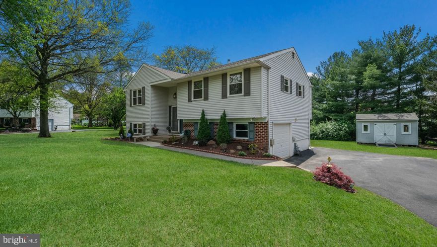 OFFERS DUE TUESDAY MAY 6th at 3:00PM.  You must see this beautifully maintained and upgraded bi-level colonial home, located in Montgomery Township.  Situated on a picturesque .46 acre cul-de-sac lot, this 3 bedroom, 1.5 bathroom home is sure to please.  As you approach the home you will immediately appreciate it's curb appeal with vast front yard, mature trees and Japanese Maple.  The owners have made many improvements recently. The lower level was remodeled in 2024, and it is a gorgeous space. There is a very spacious driveway that was expanded and paved in 2023.  The new roof (25 Year Warranty) and windows (Lifetime Warranty) were also installed in 2023.  The shed was installed in 2021.  The beautiful composite deck upgrade was completed in 2023.    The main level of this home also features 3 spacious bedrooms with crown molding and an updated bathroom.   As you enter this home you will love the open layout and original hardwood flooring.  The living room leads you to the kitchen and dining areas, which flow nicely right out to the deck.  You will certainly enjoy your days and evenings relaxing on the deck, under the removable sun shade.    The mature trees provide privacy on the upper deck and the lower patio.   The back yard is perfect for playing or relaxing.  This home is perfect for entertaining, inside and out.  On the lower level of this home you will find the beautiful family room featuring laminate flooring, recessed lighting, gas fireplace and double doors that lead to the patio.  Also on the lower level you will find a powder room, large laundry room and a mudroom.  The garage can be accessed from the mudroom.  With close proximity to shopping, dining, entertainment and employment, what more could you ask for?  Don't miss out.