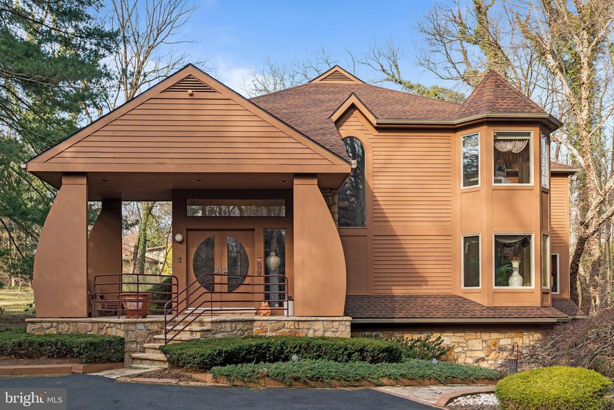 Discover this one-of-a-kind custom-built home in the prestigious Jenkintown community—where timeless architecture meets comfort, privacy, and thoughtful design. With 4 bedrooms and 4.5 baths, this spacious residence is nestled on a beautifully landscaped lot in the Abington School District, just a short commute to downtown Philadelphia, major shopping, hospitals, and commuter routes. Step into the grand marble foyer and flow through formal living and dining rooms into a cozy family room with a floor-to-ceiling stone fireplace. The eat-in kitchen is designed for both everyday enjoyment and entertaining, with built-ins and direct access to the outdoor living spaces. The main suite is a true sanctuary, featuring built-in furniture, a marble fireplace, dual walk-in closets, his-and-her baths, sauna, steam shower, whirlpool tub, refrigerator, and a private balcony with hot tub overlooking a tranquil, fenced backyard. Upstairs, you'll find a princess suite, two additional bedrooms, and a well-appointed hall bath. The finished lower level includes a full bath and flexible space—ideal for a gym, media room, or studio. A 2-car oversized garage, flagstone patio, expansive deck, and optional furnishings are available to complete the package. Also, includes a generator for peace of mind.
Elegant yet approachable, this home offers the perfect backdrop for your next chapter.