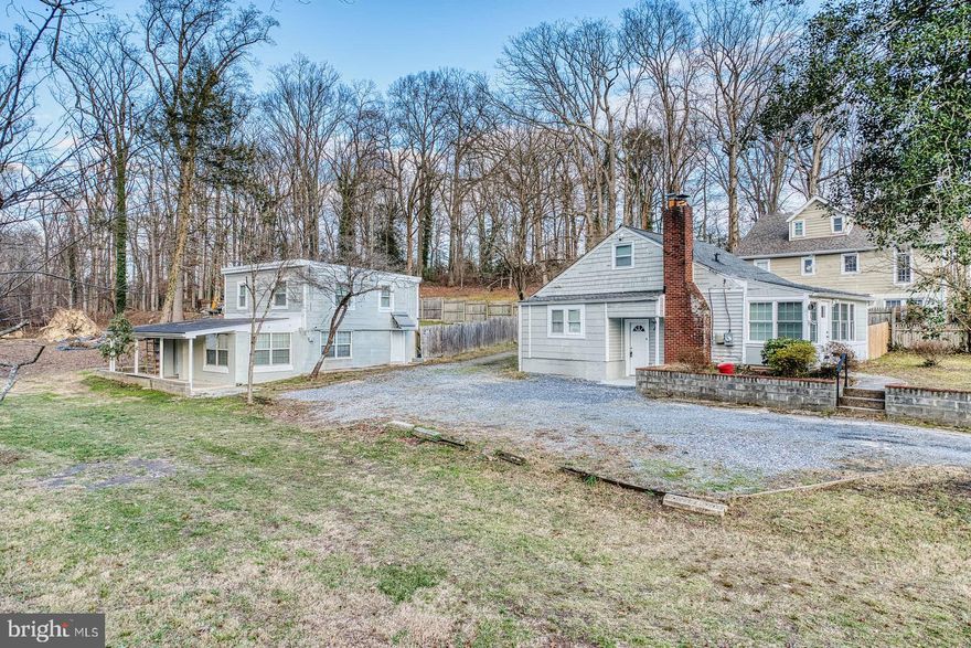 Two houses situated on a single expansive 1.5-acre lot. The rear building features two one-bedroom apartments, each with a recently replaced roof. The front house is a fully renovated three-bedroom, one-bathroom unit with a new Carrier HVAC system. Conveniently located a short distance from the University of Maryland, close to major commuting routes, and within easy reach of Washington, D.C. This property presents a unique investment opportunity with flexible living and rental potential. Do your own diligence with county to verify use. Owner financing available with  min. 30% down. House is being monitored and video surveillance.