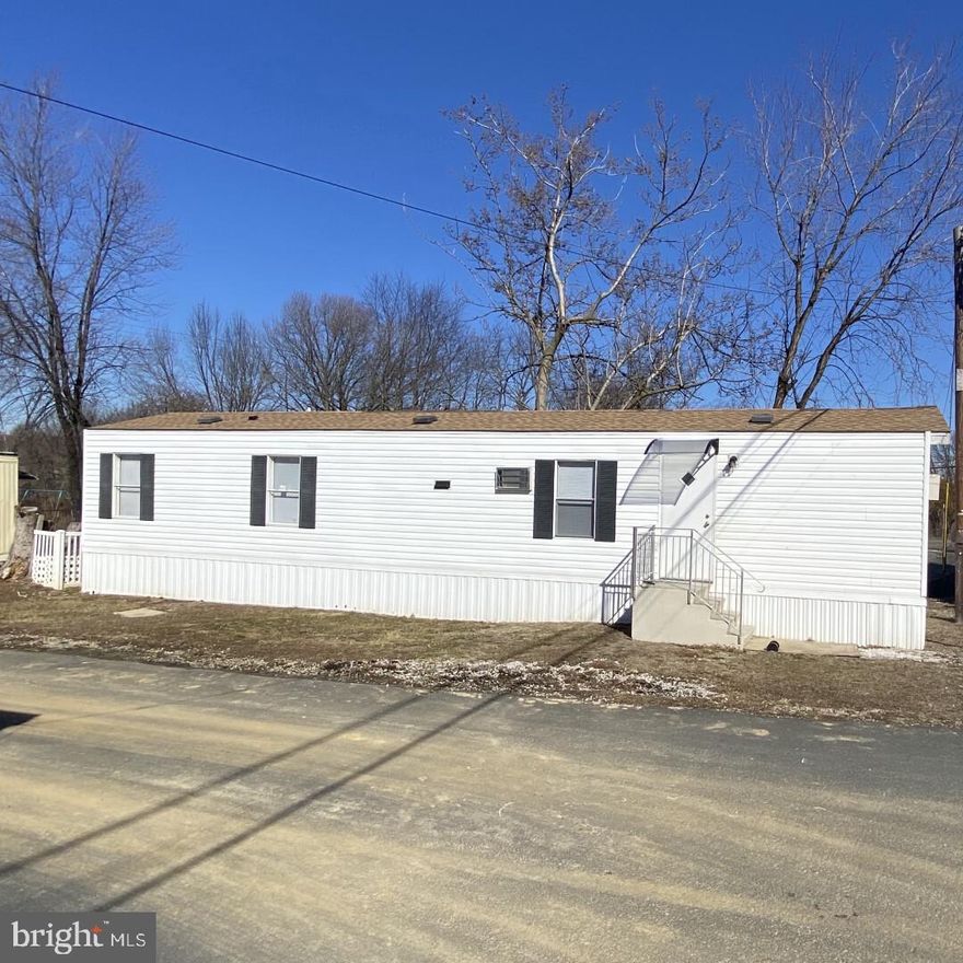 Value Priced for Exceptional Opportunity! Now listed at $54,900, this spacious 3-bedroom 1 bath mobile home offers low maintenance & truly affordable living, allowing you to maximize your housing budget in the current market. Completely renovated in 2024, this home is move-in ready and features a new roof on the
home & large shed, a new furnace, new insulated plumbing, and stylish luxury vinyl plank flooring throughout. The all-new kitchen boasts new stainless- steel appliances, a washer/dryer and microwave, new bathroom fixtures and fresh paint inside. Step outside onto the large deck off the back with great views of the park. Benefit from easy access to public transportation, major highways (95/476/202), Commodore Barry Bridge (NJ) & the PHL airport. Plus, enjoy the convenience of a 10-minute drive to Delaware for tax-free shopping. This home includes driveway parking for 2 cars and comes with a Clear Title! The lot rent ($750) covers essential services: sewer, snow removal, and community maintenance with ONLY 2 UTILITIES to manage: Water & Electric! MUST BE PARK APPROVED! Purchase options include Cash or Mobile Home Financing (ask for details). Investor Alert: This park allows owners to rent, presenting a potential income opportunity.