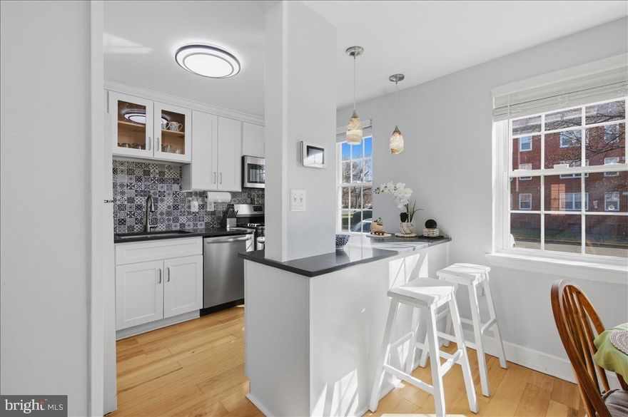 Renovated porch-level unit in the Belle View community in Alexandria. The kitchen was fully updated in 2020 with custom cabinetry, stainless steel appliances, granite countertops, and an open layout that connects well with the living space. The bathroom was also renovated in 2020 and includes modern tile, updated fixtures, custom storage, and a heated towel warmer.

The living room gets great natural light and features custom built-ins that provide additional storage without taking away from the space. Other recent updates include flooring and lighting throughout, cordless blinds, a new porch door, and a new HVAC system installed in 2023.

The Belle View condo fee includes gas, water, trash, parking, and access to the community amenities including pools, tennis and basketball courts, picnic areas, tot lots, and well maintained green space.

The location is one of the biggest draws to Belle View. You’re minutes from Old Town Alexandria and close to the Mount Vernon Trail, Belle Haven Marina, Dyke Marsh Wildlife Preserve, Belle View Shopping Center, Mount Vernon Rec Center, and the Martha Washington Library. The 11Y express bus to D.C. is just a few blocks away.

Additional basement storage and bike storage included.