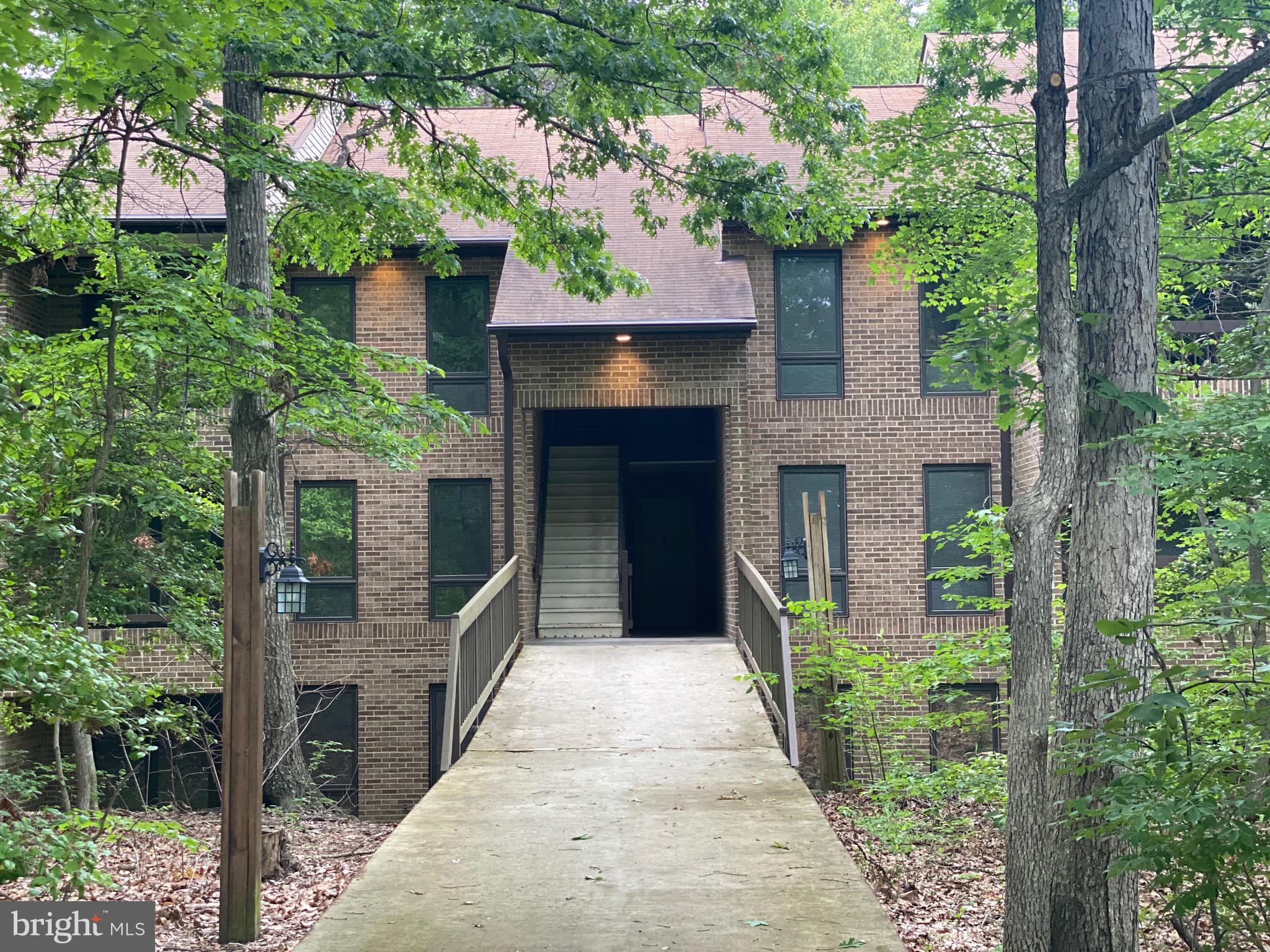 Beautiful renovated condo with open floor-plan in sought after Wildewood. This lovely unit is on the main level which means... NO STAIRS!! New flooring, new doors, new dishwasher, new garbage disposal and painted kitchen cabinets make this home a turn key property to move in and enjoy. Sit on the balcony and have a cup of coffee in the morning and relax. It's hard to believe you are just minutes from shopping, the movie theater, restaurants, and so much more. The neighborhood has awesome amenities including basketball, tennis, playground, community POOLS, trails, and more.... At this price it will not last long!