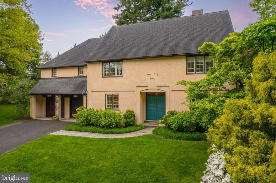 Welcome to 3 Druim Moir Ct, a gorgeous Cotswold-style home situated in the desirable residential enclave of the 50-acre Druim Moir Estate bordering Fairmount Park. A rare find, this community was designed in the 1980’s by Kise Straw & Killinger Architects, for Houston descendants who created the subdivision from the original estate built for Henry Howard Houston in 1885. This home has been lovingly upgraded over the years with luxury finishes such as oak wood floors, antique hardware, custom built-ins, modern kitchen and baths. Upon entering the vestibule you'll immediately notice the beautiful flagstone floor; the large center hall is flanked by the custom-built kitchen and dining room. The eat in-kitchen is equipped with a Wolf double oven and cooktop, Sub-Zero refrigerator, Bosch Dishwasher, Omnia antique brass hardware, Italian glass recessed downlights on dimmers, marble veined granite slab countertops, and lovely onyx tile backsplash. The formal dining room could also be used as a first floor bedroom if needed, and features built-in cabinetry, custom millwork and a full bath with marble flooring, Osborne & Little wallcovering, Grohe Faucets, and Kohler Plumbing Fixtures. The spacious, sun-filled living room is complete with a 12’ vaulted ceiling, wood-burning fireplace with black marble trim, a large bay of windows with a beautiful view of the backyard and French doors leading to the rear patio with outdoor fireplace. The versatile great room offers access to the kitchen, and also features 12’ vaulted ceilings and big bay windows. The first floor offers many different configuration options to suit your family’s needs. On the second floor, you'll find 3 spacious bedrooms, a hall closet, laundry room, and a cozy office. The full hall bathroom features a green onyx slab shower, tub fascia, sink top & mirror frame/base, white marble tile flooring, Kohler plumbing fixtures, Brookhaven custom cabinetry, and Artemide ceiling lighting and wall sconces. The primary suite has a walk-in closet, a second bonus closet, and a full bath with a jacuzzi shower/bath, custom wood cabinetry, marble slab sink with a mirrored wall, antique brass hardware, Kohler plumbing fixtures, Grohe faucets, and an Artemide ceiling fixture. The private backyard is a little oasis with a beautiful, custom-designed stone fireplace with frieze, perennial gardens, 2 flagstone terraces, and a full garden sprinkler system. All this and an attached, oversized two-car garage with ample storage. This immaculate home offers everything you love about living on a historic Chestnut Hill estate, including: 10 acres of commonly owned pristine lawns, English formal gardens, and stately trees; with none of the maintenance. Just 1/2 mile from the train line to Center City, 1 mile from the quaint cobblestone main street of Chestnut Hill and easy access to the walking trails of the Wissahickon section of Fairmount Park. Druim Moir is one of Chestnut Hill’s best kept secrets. Please note that the City of Philadelphia has conducted a real estate tax reassessment, effective January 1, 2023. If you have any questions or concerns about the impact of this process on the future real estate taxes for this property, you should contact the City of Philadelphia. The telephone number and email address are set forth in the Seller's Property Disclosure Statement.