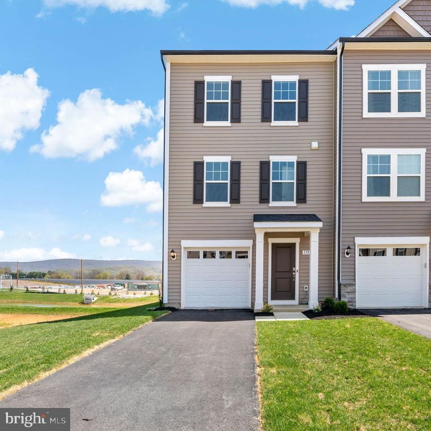 *OFFERING UP TO $12,500 IN CLOSING ASSISTANCE FOR PRIMARY RESIDENCE WITH USE OF PREFERRED LENDER AND TITLE.* 
Welcome to the York II at Kings Crossing! Fantastic commuter location to NOVA/MD, this brand new 3 bedroom, 3.5 bathrooms, 1-car garage townhome is waiting for you. Featuring a bright open 1st floor plan with a morning room, 8 1/2 ft island, upgraded shaker style kitchen cabinets with gorgeous Miami Vena quartz kitchen countertops, stainless steel appliances, pendant lighting and much more. Popular luxury vinyl plank adorns the entire 1st floor. The spacious primary suite provides great natural light and a walk-in closet. The ensuite features tile flooring, dual sink vanity, soaking tub and a walk in shower with tile surround. 2 additional bedrooms, full bath and laundry area complete the upstairs. EXTRA BONUS: This home has a finished rec room with walkout basement to the large backyard and full bathroom which easily has the potential of being a sizeable 4th bedroom if needed.