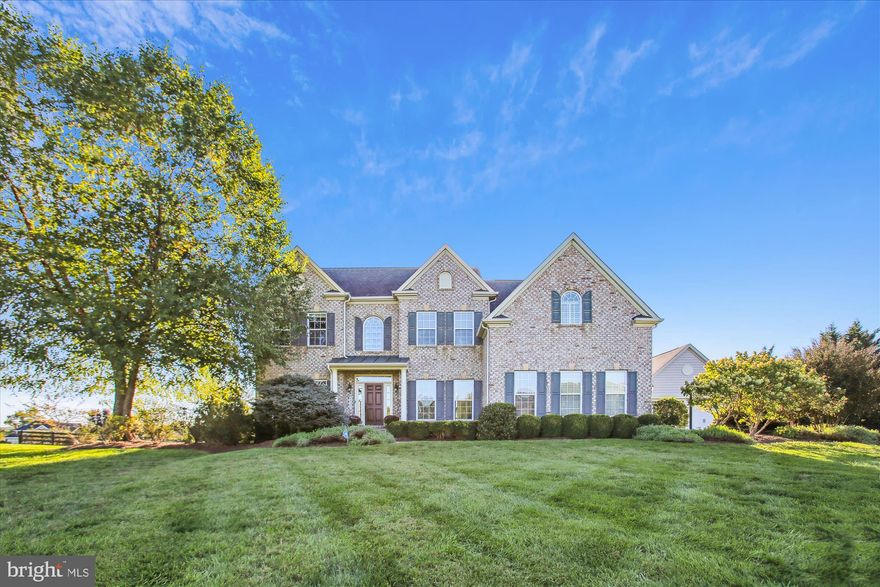 Open House Saturday 1-3pm! Set on a quiet 3-acre lot with wide-open countryside views, this NVHomes-built Remington Place blends space, style, and everyday practicality. Inside, the main level features hardwood floors throughout, a two-story foyer, and formal living and dining rooms with detailed crown molding. A private rear office with French doors offers a dedicated workspace, while the vaulted-ceiling great room and gas fireplace create a relaxed gathering space.

The kitchen was updated in 2019 with a large ebony island, granite counters, stainless steel appliances, a wine cooler, and walk-in pantry with custom shelving. Open to the solarium and breakfast area, it’s designed for flow—indoors and out. Step through to the covered porch, rear deck, and saltwater pool—perfect for warmer months. A second detached garage adds to the home’s flexibility, with four garage spaces total.

Upstairs, you'll find three secondary bedrooms—one with a private en suite and another with laundry hookups—as well as a full hall bath. The primary suite offers two custom walk-in closets, a tray ceiling, and a large updated bath with heated floors, dual granite vanities, a soaking tub, and separate spa shower.

The finished lower level includes two additional bedrooms, an updated bathroom, and plenty of space for media, games, or guests. Outside, the fenced backyard features professional landscaping, a 15-zone sprinkler system, a patio, pool shed, and mature privacy screening.

With thoughtful updates, functional spaces, and a great setting, this home is well-suited for both relaxing and entertaining.