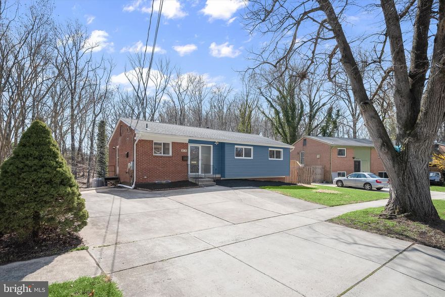 Absolutely amazing home! Roof: 7-year-old architectural shingles. Freshly painted. Gorgeous kitchen with new cabinets, quartz countertops, and SS appliances. Remodeled baths, refinished real wood floors throughout the main level, and LVP flooring in the basement.
The full walkout basement is a true highlight—flooded with natural light, it feels open and inviting rather than below grade, with options for 2 additional bedrooms depending on how you use it. Step outside to a private backyard that backs to a wooded area, providing serene green views from both levels. The expansive patio off the basement recreation room is perfect for entertaining guests.
Additional features include a whole-house generator and off-street parking for up to four vehicles. Ideally located just minutes from the DC line, short drive to University of Maryland, Catholic University, and everything DC Metro area has to offer. Short walk to NW Branch Trail, which connects to a vast network of biking and walking paths—perfect for nature lovers and biking enthusiasts. This home truly combines comfort, convenience, and style.