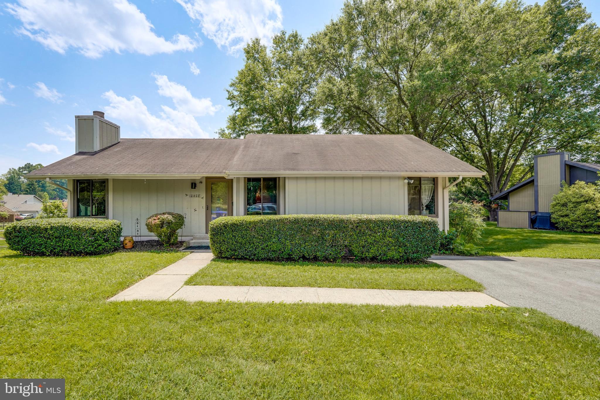 Charming and well-maintained 2-level home offering over 2,300 square feet of living space in the desirable Stedwick community of Montgomery Village. This spacious 3-bedroom, 2-bathroom residence features a functional layout with generous living and dining areas, a wood-burning fireplace, and a partially finished walk-out basement that provides flexible space for a recreation room, home office, or storage.
The kitchen was fully renovated in 2020 and features rich Neff wood cabinetry, quartz countertops, KitchenAid stainless steel appliances, and a custom tile backsplash—a beautiful blend of warmth, style, and function. Just off the kitchen, the rear deck offers a perfect spot for grilling, outdoor dining, or relaxing in a cozy seating area.
Additional updates include new windows (2018–2019) for improved energy efficiency, HVAC system (2019), water heater (2018), and a refreshed full hall bathroom (2015). The walk-out basement opens to a spacious backyard, offering even more potential for outdoor living.
Other highlights include a private driveway, ample storage, and access to Montgomery Village’s many amenities—including community pools, walking trails, playgrounds, and more. Conveniently located near shopping, parks, and major commuter routes.