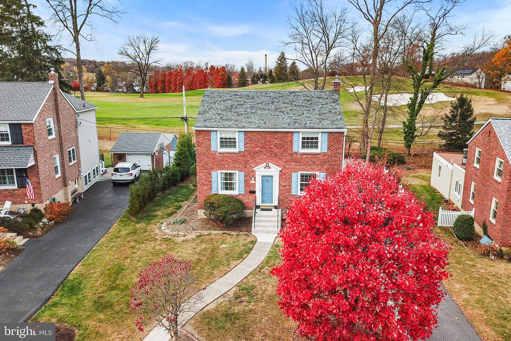 Welcome to this meticulously cared for, two-story Colonial home in the heart of Springfield.  Offering an ideal blend of comfort and style, this home has been expanded with a two story addition which allows for copious possibilities. Original hardwood floors greet you as you walk through the front door and stretch throughout the living and dining rooms. The large living room is drenched in natural light and opens up to both the dining room and the back of the home where the welcoming den awaits.  With its large picture window framing stunning views of the Rolling Green golf course, this quickly becomes a favorite space. This view is a rare and peaceful backdrop for daily living. The dining room exudes charm and elegance with two corner built-in cabinets, and wainscotting on the bottom half of the wall. The kitchen sits through the den and dining room, creating a smooth transition between the entire main level.  A half bath and access to the basement complete this level.  All four spacious bedrooms are upstairs, with an abundance of natural light. The luxurious primary bedroom has brand new wall to wall carpet, ample closet space and a private bath.  The 3 huge additional bedrooms have spacious closets and hardwood floors and share a full hall bath.  The basement offers fully finished additional living space, as well as storage/laundry/workshop area. The one car expanded garage is attached to the home and accessible by way of the basement back door.  Mechanical updates include updated HVAC, water heater, roof, driveway.  Replacement windows can be found throughout. The private backyard provides a serene outdoor retreat, perfect for relaxation and bird watching.  Situated in a friendly, sought-after neighborhood, this home offers easy access to major highways, making commuting a breeze.  This lovingly maintained property is a true gem, offering the space, charm, and convenience that makes it stand out from the rest in Springfield. Don't miss the opportunity to make this exceptional home yours!