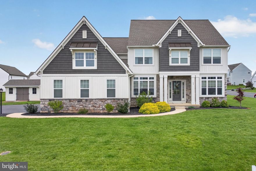 Former award-winning Garman Builder's model home in Strathford Meadows offering 4 bedrooms, 2.5 baths, and nearly 3,400 square feet of elegantly designed living space. Ideally located on a .39-acre corner lot within walking distance to Cedar Crest High School and with community access to Lebanon Valley Rail-Trail. This like-new home blends everyday convenience with elevated design and upscale finishes throughout. The gourmet island kitchen is beautifully appointed with quartz countertops, stainless steel appliances, a built-in wall oven, gas range with hood vent, and a walk-in pantry. The main level features a spacious family room with large custom windows and a striking stone-surround gas fireplace, flowing seamlessly into a formal dining room and a bright breakfast nook. The private study provides a quiet workspace, while a well-placed laundry room, mudroom, and powder room complete the first floor. Upstairs, an extra-wide hallway with a tray ceiling creates a grand approach to the owner’s suite, highlighted by elegant French door entry. The expansive suite offers a true retreat with two walk-in closets, tray ceiling and shiplap accents, and a luxurious bath featuring dual vanities, freestanding soaking tub, and a large glass-enclosed tile shower. Three additional generously sized bedrooms each include their own walk-in closet and share a full hall bath. Enjoy outdoor living on the rear composite deck overlooking the backyard. Ample storage and parking with a 3-car attached garage. Additional features include custom closet organizers, custom window treatments, ceiling fans, a 12x16 storage shed. Built with superior basement walls and equipped with efficient gas mechanicals including an over-sized gas water heater, this home offers a truly move-in ready opportunity in a highly sought-after community, with no HOA! Schedule your private showing today!