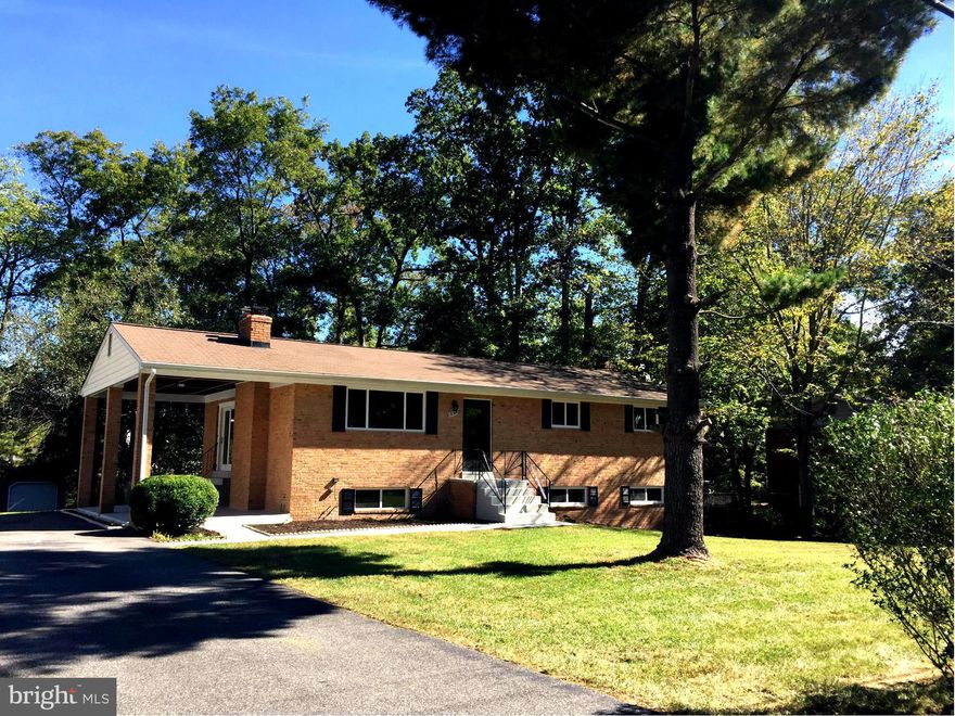 A Meticulously renovated home in a peaceful neighborhood with a oversized yard. This fabulous layout home featuring open plan living area with 2 Fireplaces ,new kitchen cabinets, granite and breakfast island, hardwood on main level, new carpet in basement. New windows and Doors. Walkout basement to a patio. Second covered patio off dinning room. Conveniently located near by stores & commuters lot