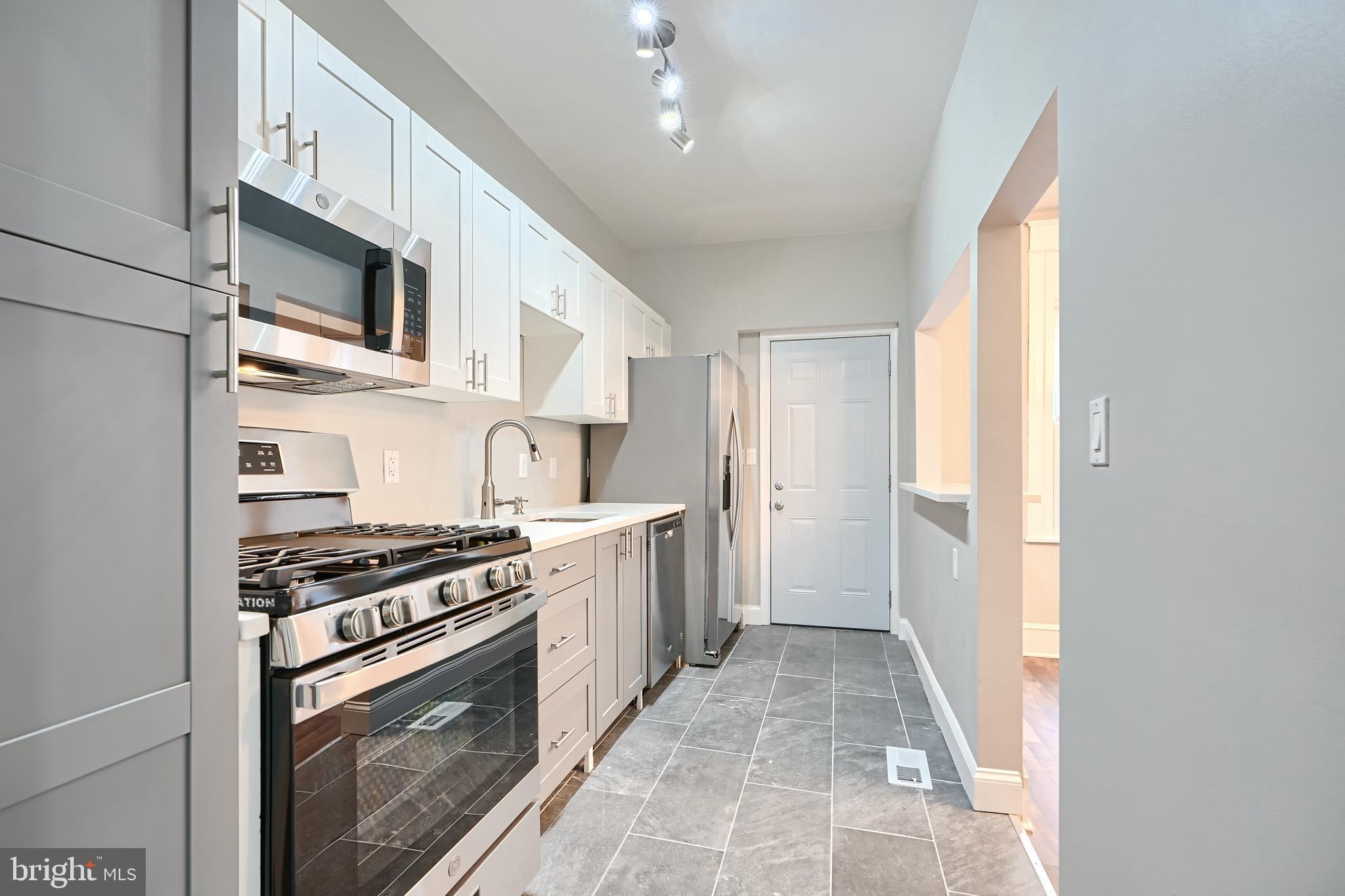 Discover the warmth and charm of this fully renovated space, offering a delightful private view of the park. The total makeover brings in new lighting, upgraded flooring, a refreshed bathroom, a kitchen adorned with gleaming granite countertops, a pass-through bar in the dining room, stainless steel appliances, and a touchless faucet. Imagine unwinding in your tranquil backyard, designed for your escape. The unfinished basement awaits your creative touch, providing a blank canvas for your ideas. Embrace the cozy appeal of this inviting haven, where comfort and style seamlessly come together.