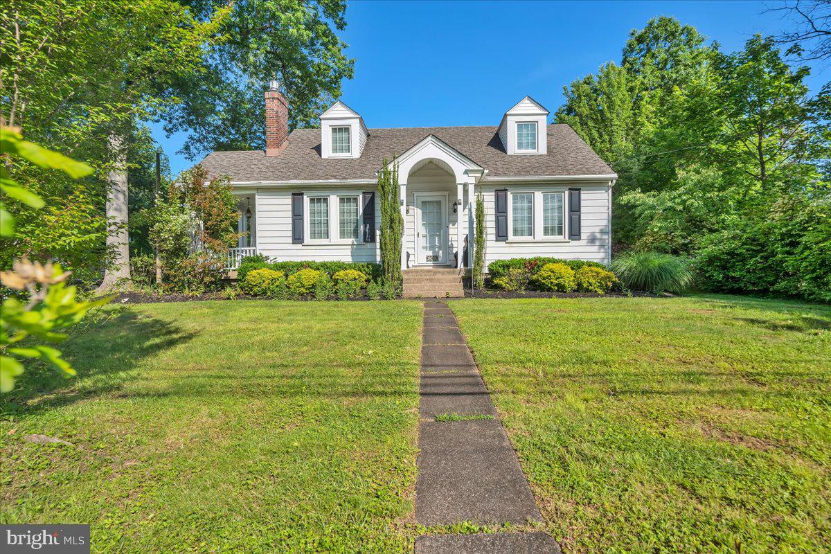 **Note: Offer deadline Sunday June 8 at 8pm**
Welcome to this charming 3BR/2BA Cape Cod in historic North Wales Borough! Features include 2 covered porches, hardwood floors, and natural gas fireplace. Bright kitchen with skylights, stainless appliances, cooktop with hood, pantry, and ample counter/cabinet space. Formal dining room with built-in curio cabinets. Living room features a gas fireplace, Large rear deck ideal for entertaining. First floor offers 2 spacious bedrooms and full bath. Upstairs, the primary suite features skylights, recessed lighting, double closets, and a private cooling system. Full bath with double vanity, stand-up shower, and skylights. Bonus loft area perfect for office. Professionally waterproofed basement with Bilco door access. Detached 2-car garage. Plantation shutters throughout. Walk to schools, train, and downtown. Minutes to major highways, public transit, and shopping. Don’t miss this gem—schedule your showing today!
**Note: Offer deadline Sunday June 8 at 8pm**