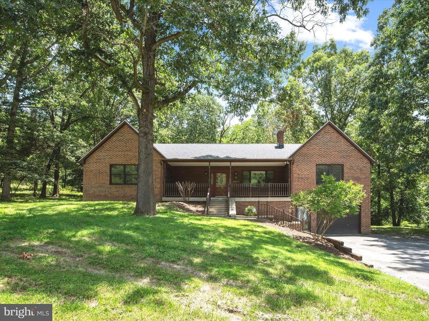 Unique raised ranch style home on seven parcels totaling 1.39 mostly wooded acres! Located in the convenient Blue Ridge Acres community, this spacious home features more than 2,300 above grade square feet plus an unfinished walkout basement. Recent updates include a brand new roof, new water treatment system, and fresh paint throughout. The open-concept floor plan is accentuated by a two-sided brick propane fireplace, adding warmth and ambiance to this home. The large kitchen seamlessly connects to the family room with vaulted ceilings and adjacent formal dining room. Enjoy the conveniences of single-level living with 3 easily accessible bedrooms, including a roomy primary suite featuring a custom designed walk-in closet and attached bath with jetted tub. The deep front porch and recently refinished back deck overlook the serene setting of this beautiful property. Providing easy access to both Maryland via Rt. 340 and Virginia via Rt. 9, this home is in a great location for both commuting and accessing local amenities. The Blue Ridge Acres neighborhood also provides river access and a community pool for an optional annual fee. You'll love the efficient, one-level floor plan and recent upgrades featured in this home! *XFINITY INTERNET AVAILABLE*
