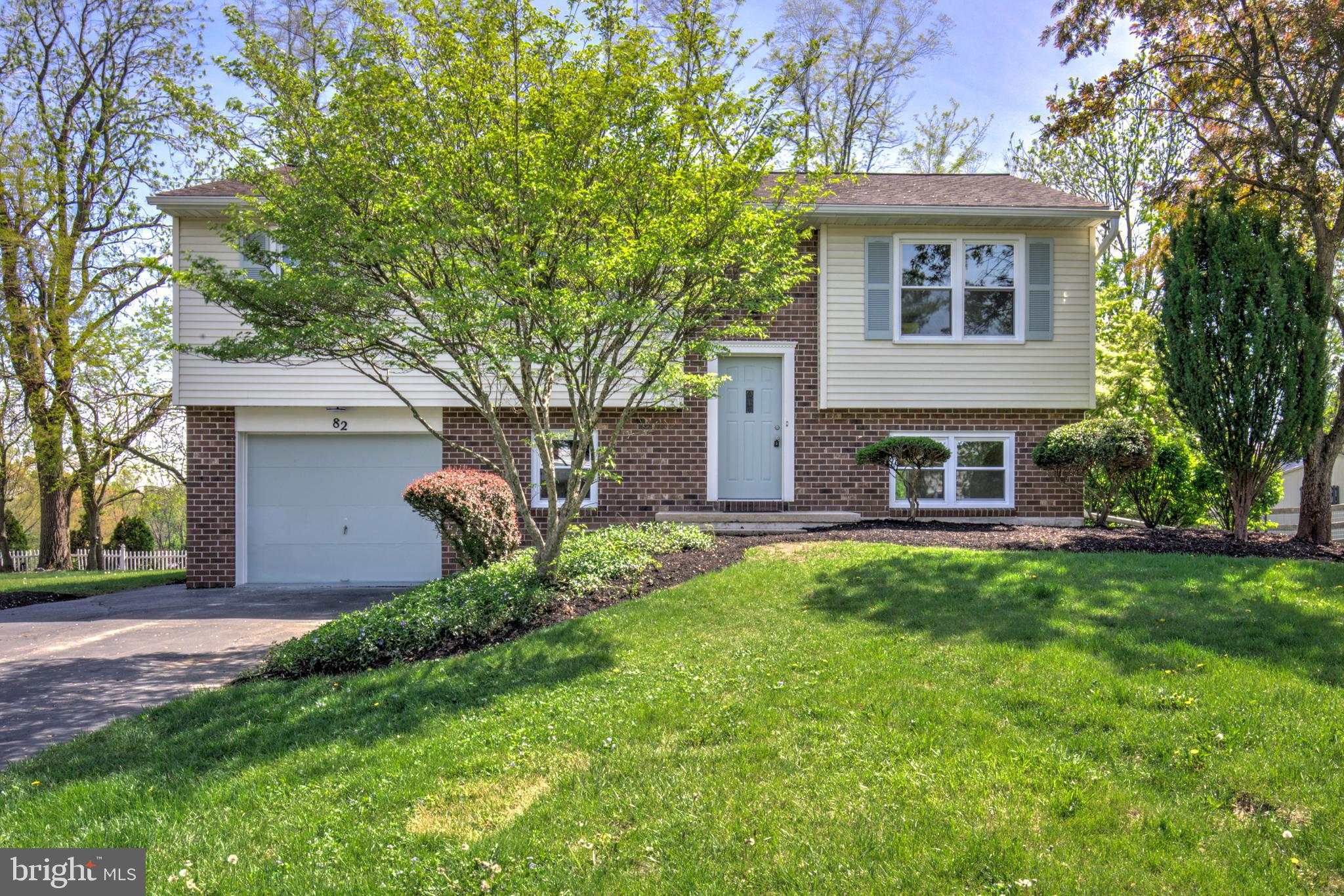 Welcome to 82 Allen Rd – a beautifully updated 4-bedroom, 2-bath bi-level home with an attached garage! Nestled in a quiet neighborhood, this home is a must-see for anyone seeking comfort, style, and functionality. It boasts both a welcoming front yard and a spacious backyard—ideal for outdoor play, gardening, or hosting gatherings. Step into the main level, where you're greeted by a bright, open living area enhanced by new luxury vinyl plank flooring. The space flows seamlessly into the dining area and a stunning, fully renovated kitchen. This kitchen features a serving bar, sleek cabinetry, quartz countertops, a stainless-steel sink, and brand-new appliances. Double glass doors in the dining area flood the space with natural light and open onto a back deck—perfect for grilling or enjoying warm evenings outdoors. Also on the main level, are three comfortable bedrooms and a beautifully remodeled full bathroom featuring a tiled tub/shower combo, thoughtfully designed with a second door providing direct access to the primary bedroom. The lower level offers even more living space with an oversized, carpeted family room and direct access to the attached garage—ideal for cozy movie nights or a versatile playroom. You'll also find a fourth bedroom and a second full bathroom downstairs, making it a great setup for guests or multi-generational living. This house also brings peace of mind with brand-new windows, fresh paint and updated light fixtures throughout, and a completely new HVAC system. Enjoy convenient access to Route 222, with Dutchway Farm Market and downtown Ephrata just minutes away. With its beautiful updates 82 Allen Rd blends modern convenience with timeless charm—ready for you to move in and make it your own.