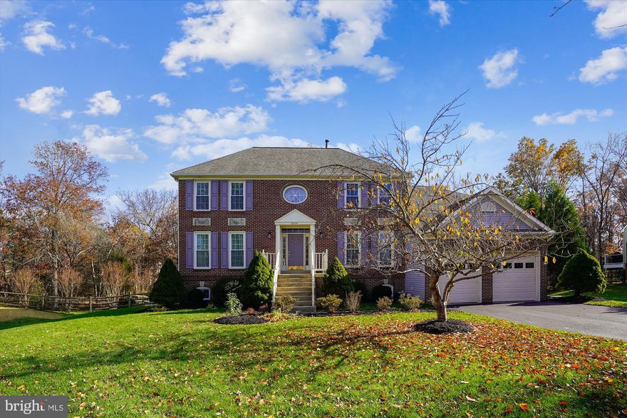 Absolutely amazing brick front colonial located in the sought after Westport of Virginia Run neighborhood. The Kingsmill model, built by NV Homes, is one of their largest models and is perfectly situated on a quiet cul-de-sac. Step inside to an elegant entrance and spacious foyer.  This home w/4 BR/4.5BA features Gleaming hardwood floors throughout the main level.  The updated kitchen features stainless steel appliances, granite countertops, center island, desk work area, walk-in pantry, and the laundry and mudroom off the kitchen leads to the garage. A generously sized deck is conveniently located off the kitchen and off the family room, perfect for entertaining. Large separate Living Room and Formal Dining Room, and a home  Office with custom built-in bookcase and cabinets.  Brick Fireplace in family room also features dramatic vaulted ceiling and skylights!  The upper bedroom level starts with a walkway overlooking the foyer and great room. Generous owners suite w/recently updated Luxurious bath with glass enclosed and oversized shower, soaking tub and large walk-in Closet.  On the opposite side of the walkway is a princess suite  with private bathroom. Two additional bedrooms on this level connect with a Jack N' Jill bathroom.  Fully Finished Lower Level with Rec Room, Office or possible 5th BR & full Bath.  Full walk out to the patio and private fenced backyard.  Great Centreville location w/great community amenities & close to major commuter routes.